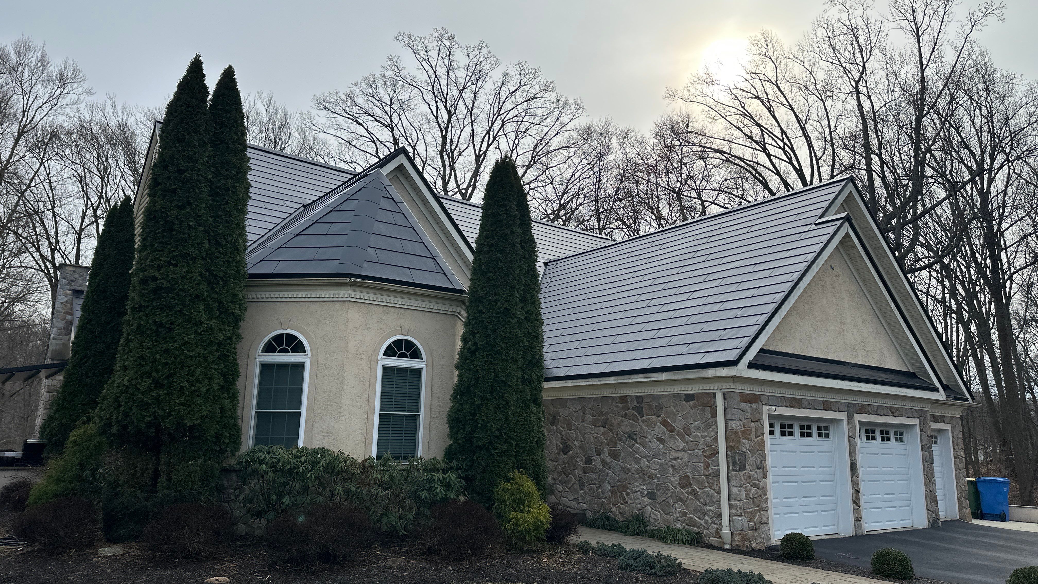 Tesla Solar Roof  using Tesla Powerwall by American Home Contractors