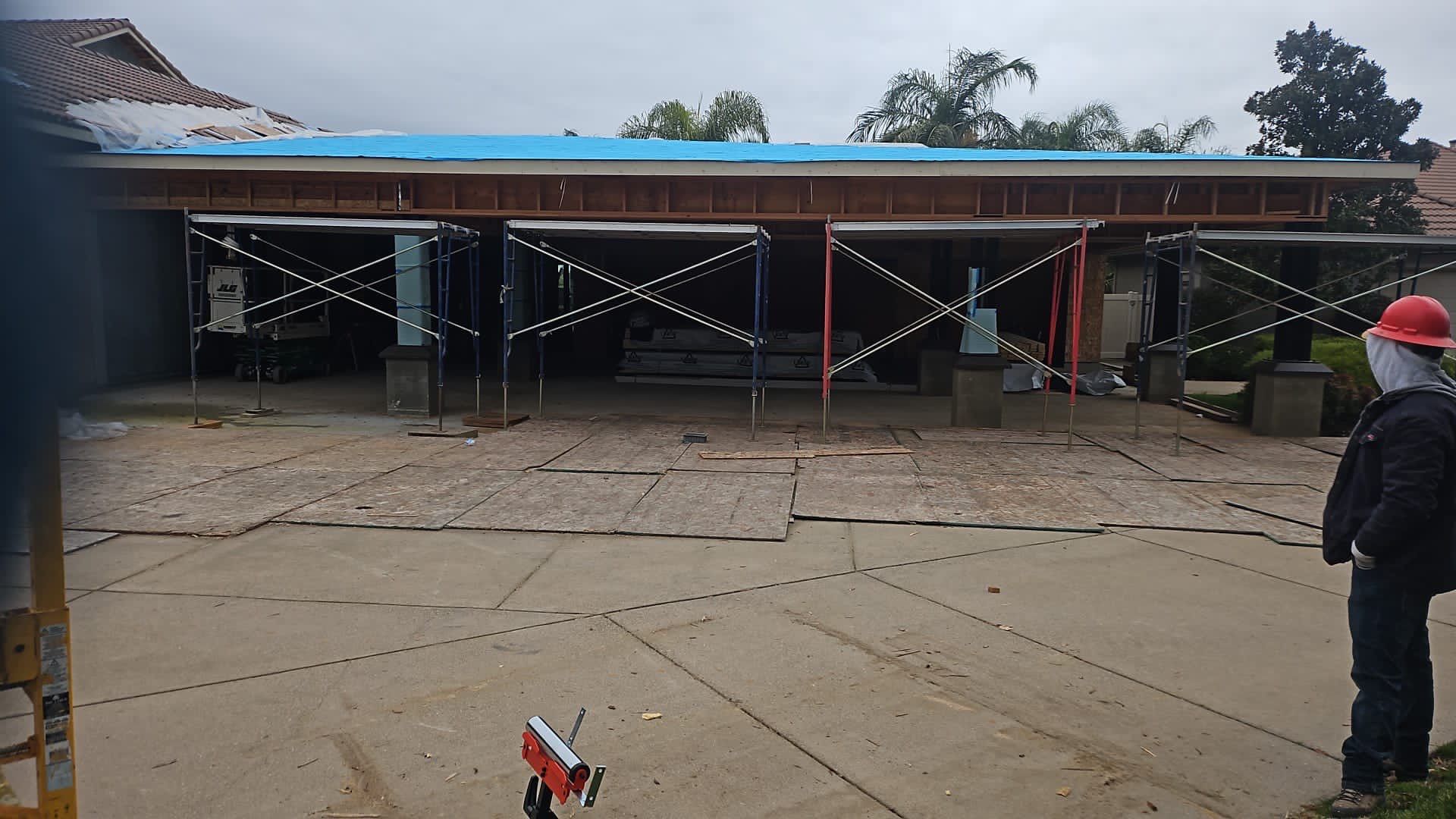 Tile, Metal, and TPO roofing project (new construction) by Straight Edge Roofing Inc