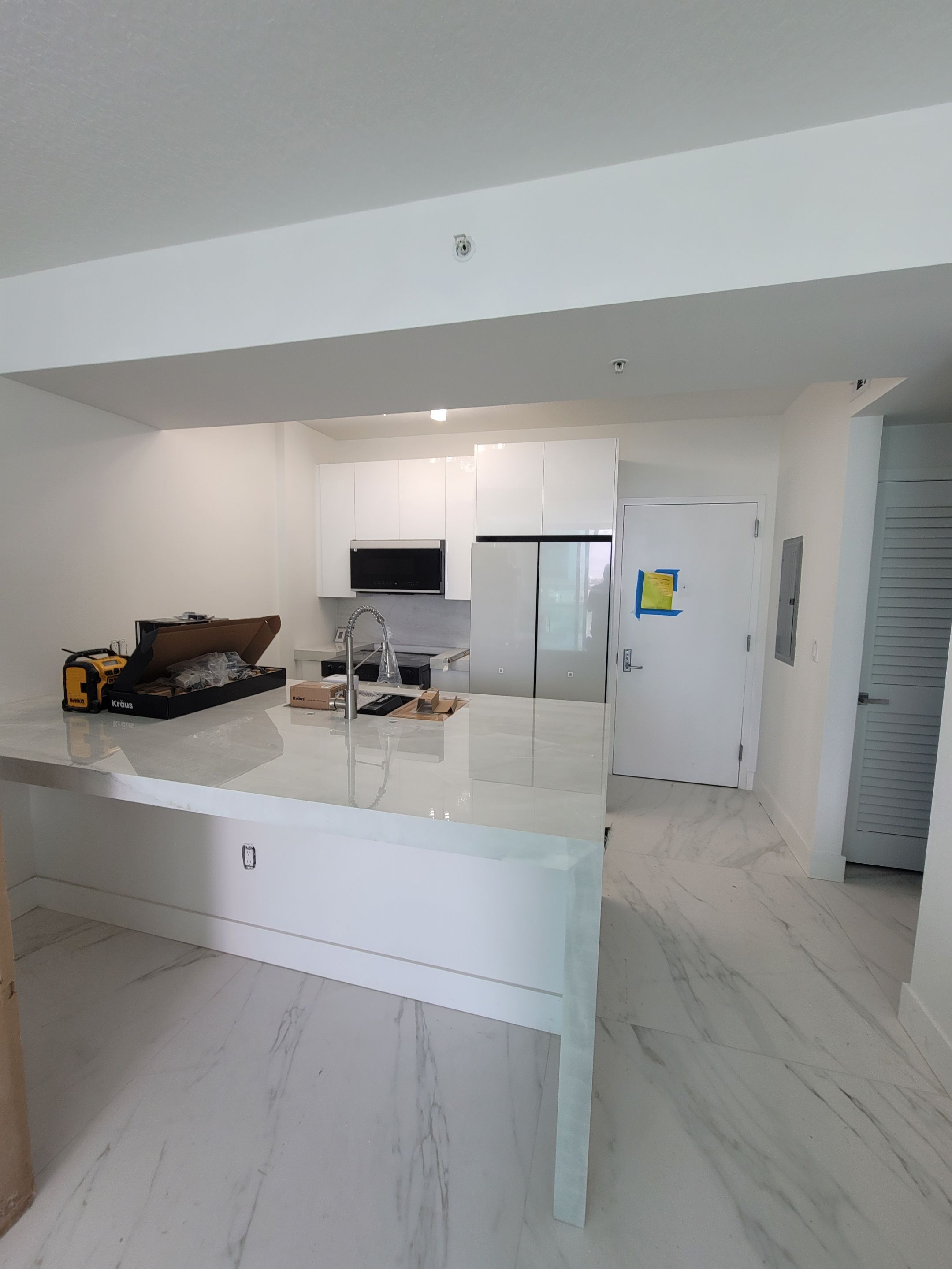 Modern High-Rise Interior Renovation and Custom Tile Installation in Miami by Picos Construction Engineering
