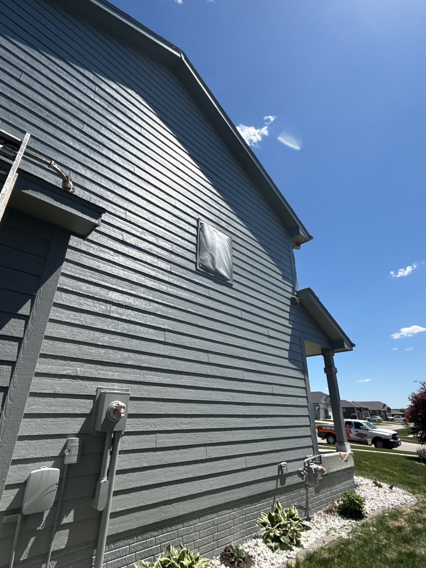 Residential Exterior Repaint in Ankeny by Midwest Paint LLC