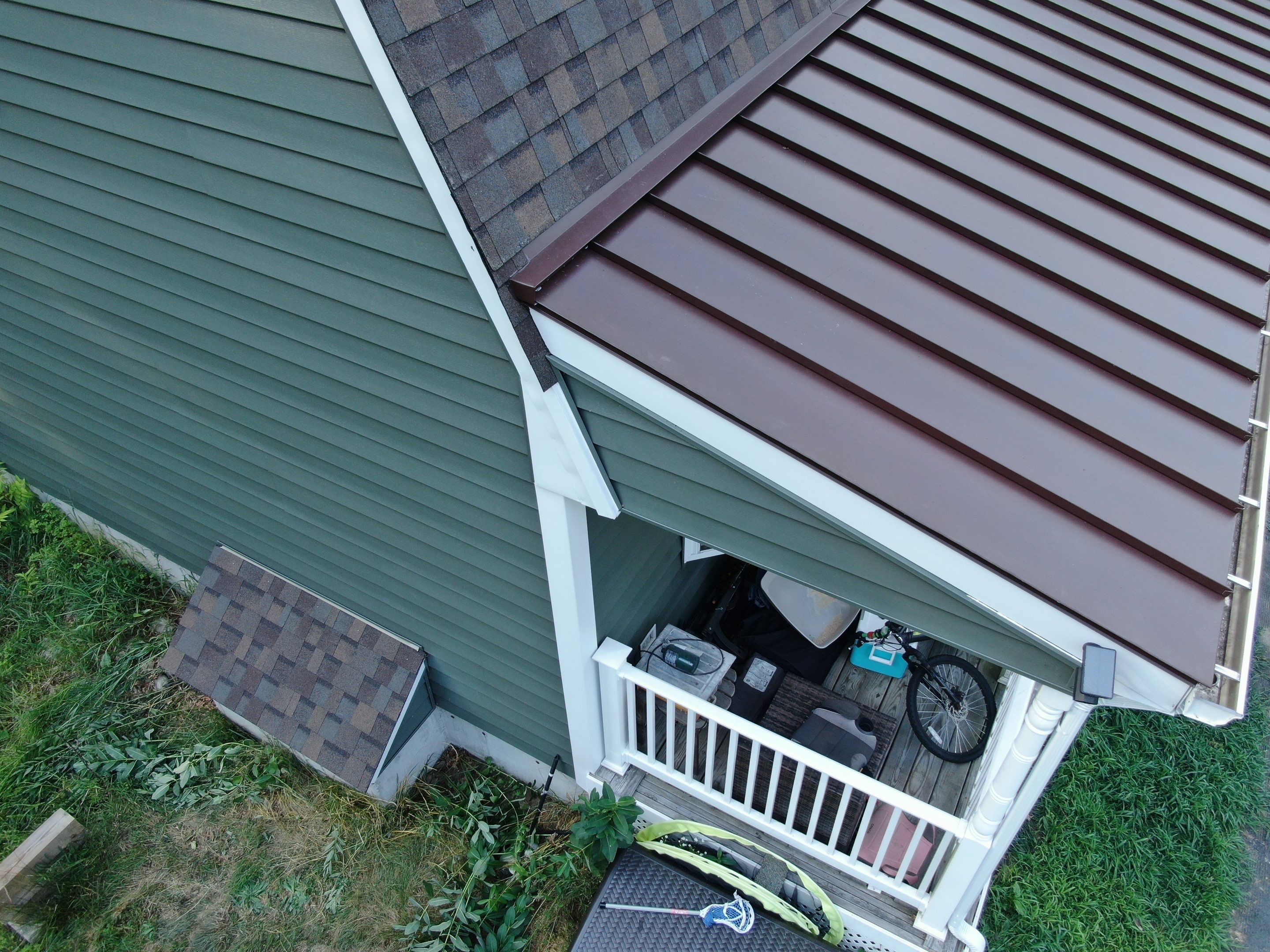 Full Roof Replacement & Farmers Porch Restoration – Asphalt + Standing Seam Metal by Mighty Dog Roofing of Greater Middlesex County