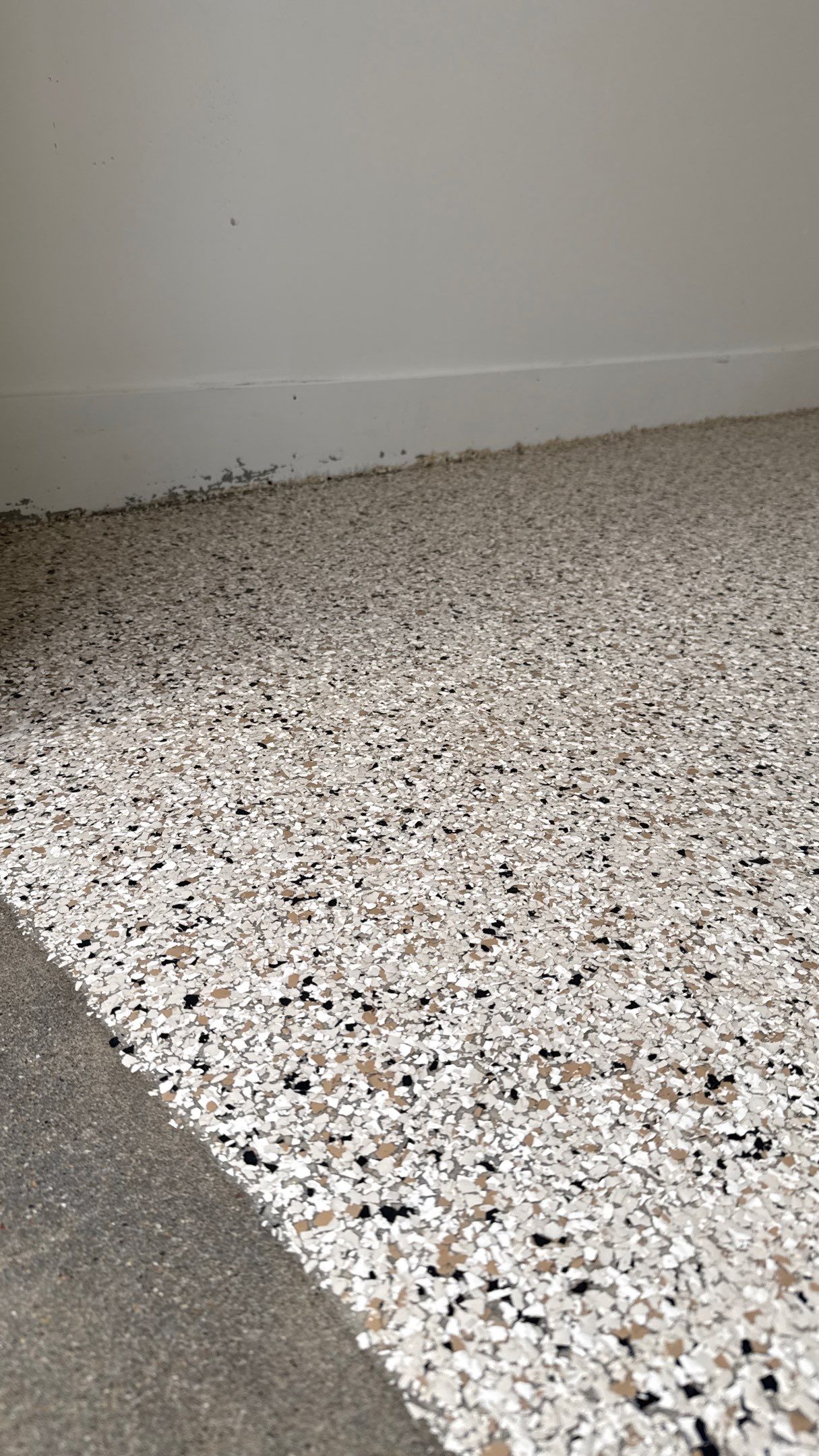 Check Out This Beautiful Shoreline Flake Floor  by Banner Garage