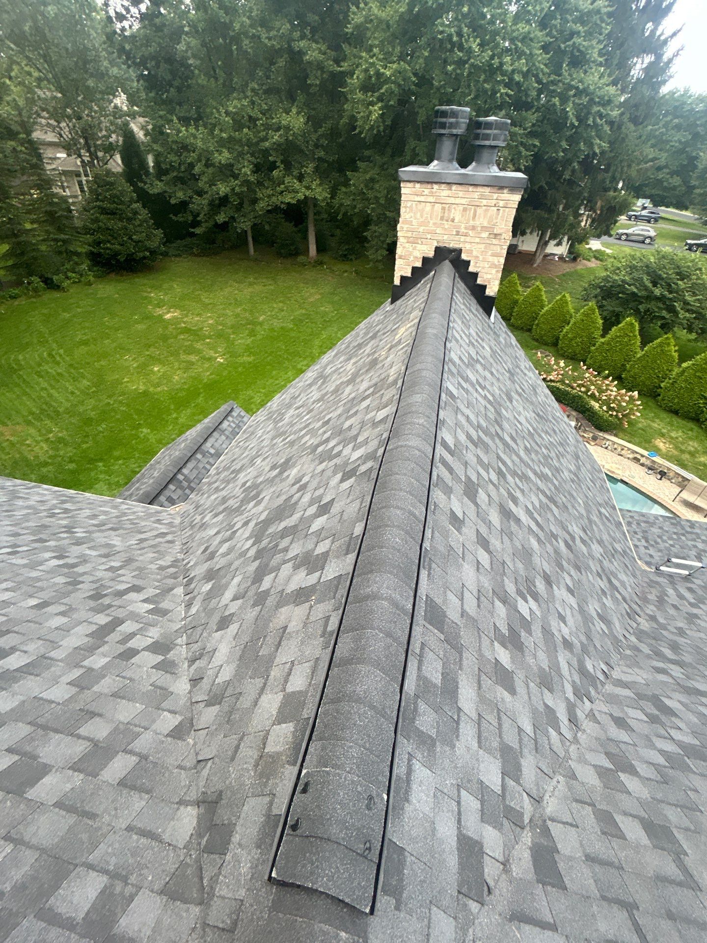 Great Falls : residential Roof with CertainTeed Landmark Pro in Max Def Moire Black  by RM Banning, Inc.