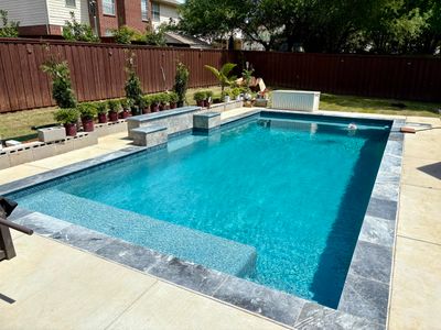Geometric Pool with Raised Water-Feature Wall