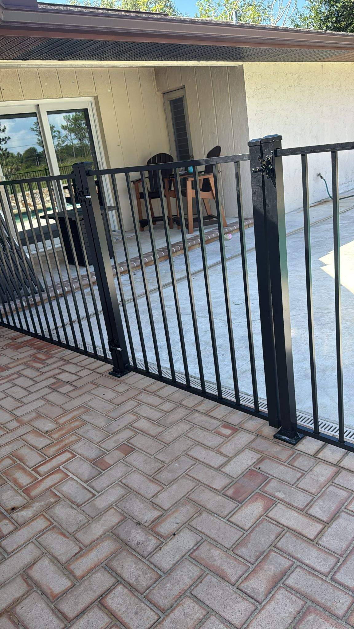 Black Aluminum Pool Safety Fence Installation in Punta Gorda by True Fence LLC