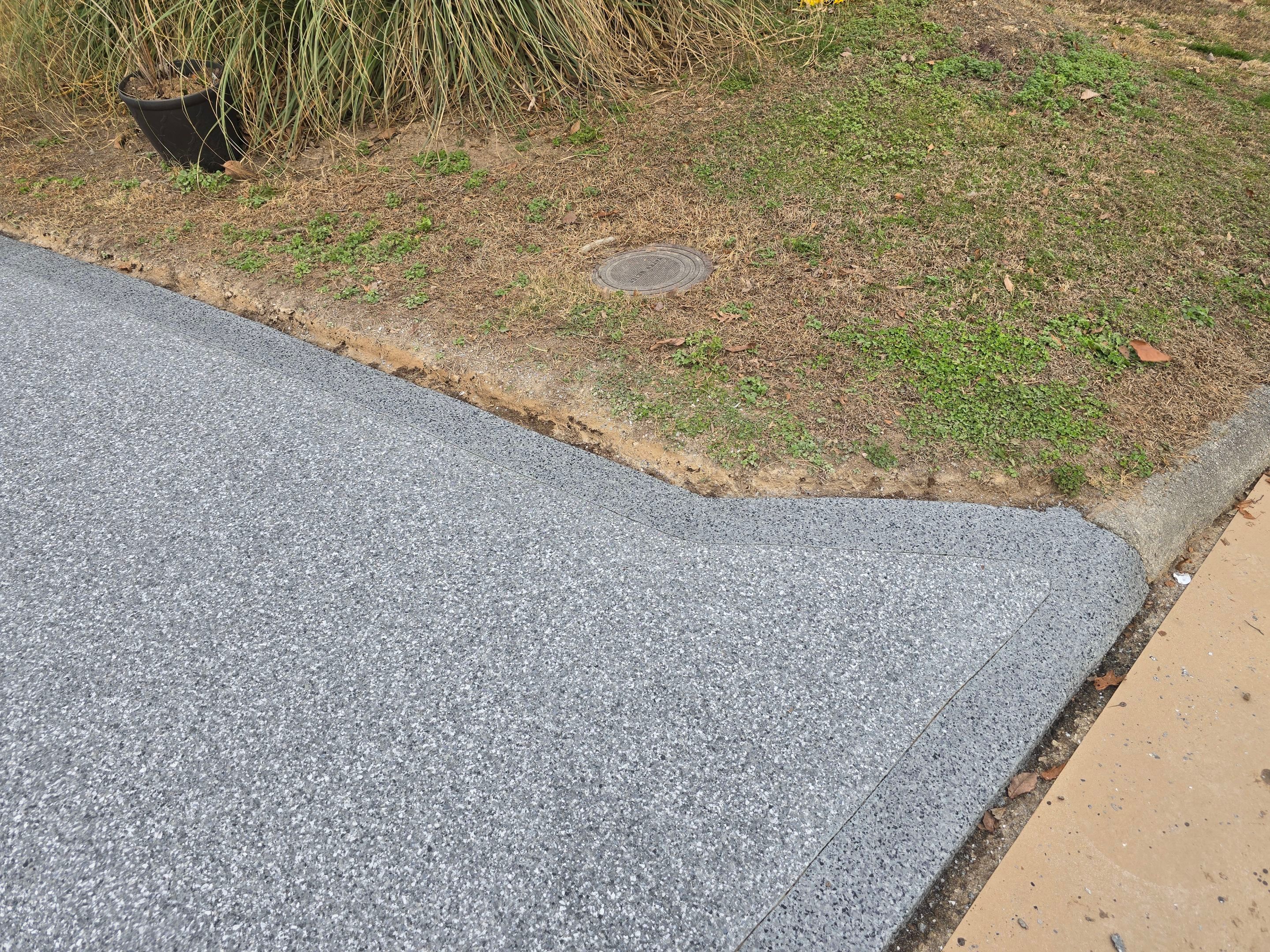 Driveway Using Weathered Gray with the Border in Nightfall by Elite Floor Solutions