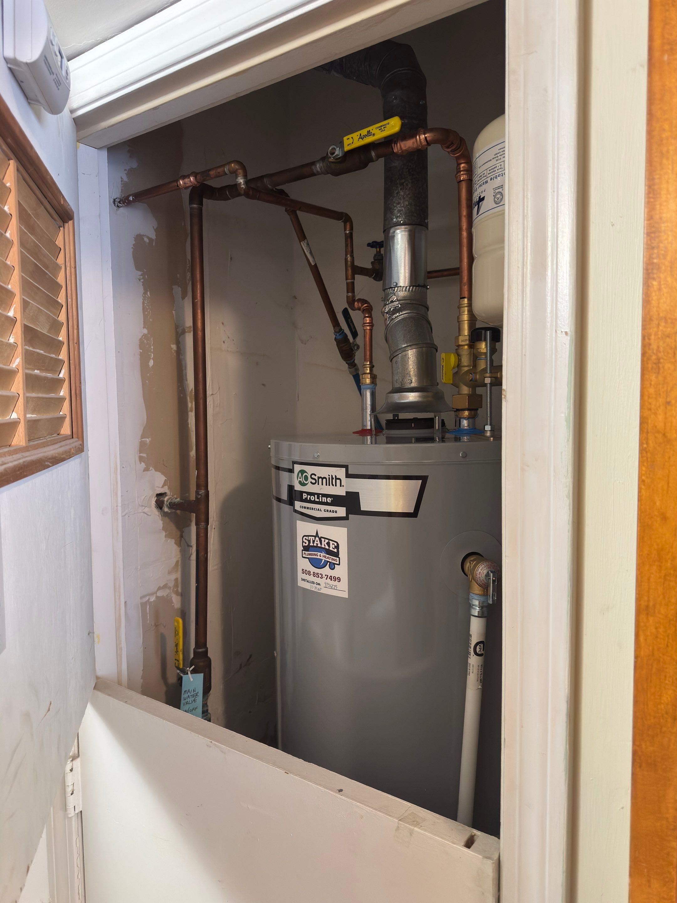 Closet Water Heater Replacement by Stake Plumbing and Heating