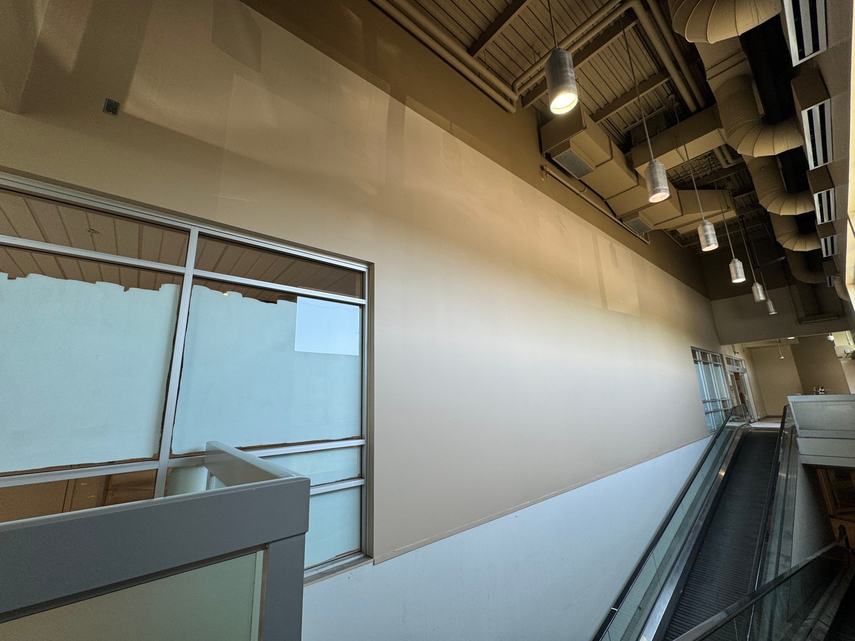 Commercial Prime & Paint Project-30ft height by YVR Construction Group