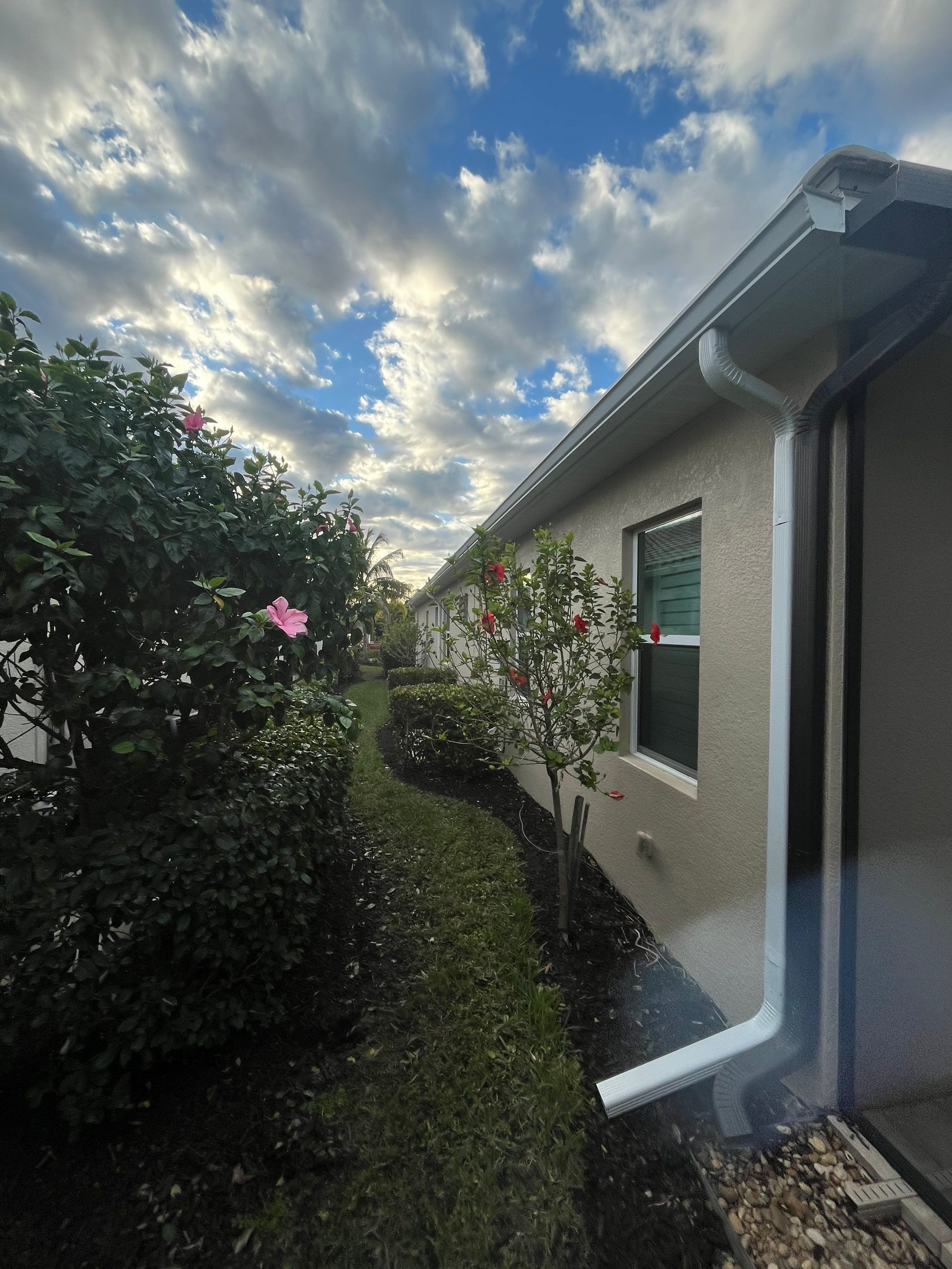 Downspouts using White Down Spouts in Fort Myers FL by Gutter Professors