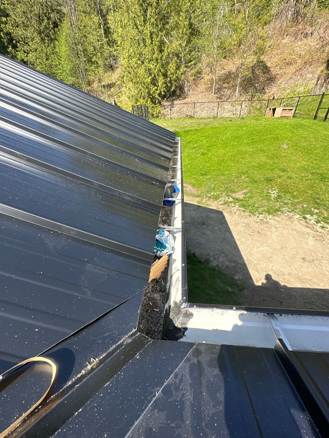 Residential ReRoofing Installation using 12" Prolok metal by Top Notch Roofing Inc