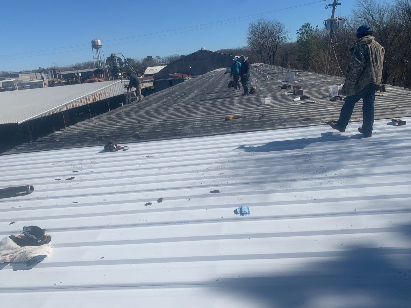 Commercial Roofing Installation using Aluminum Roofing panels by Hostetler Roofing