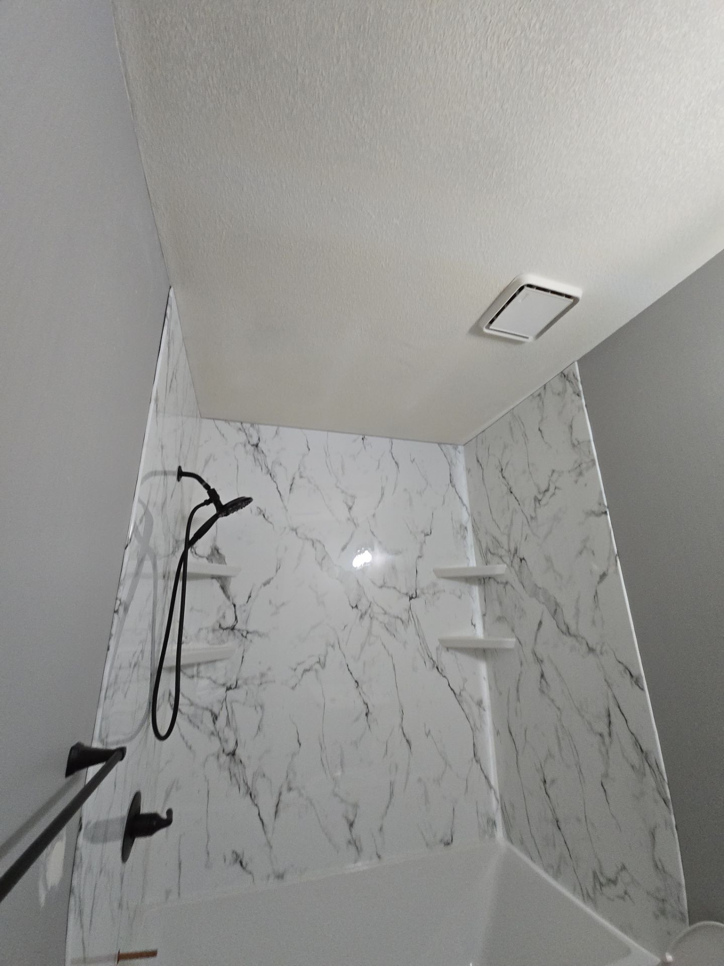 New bathtub and flooring by The Shower Company