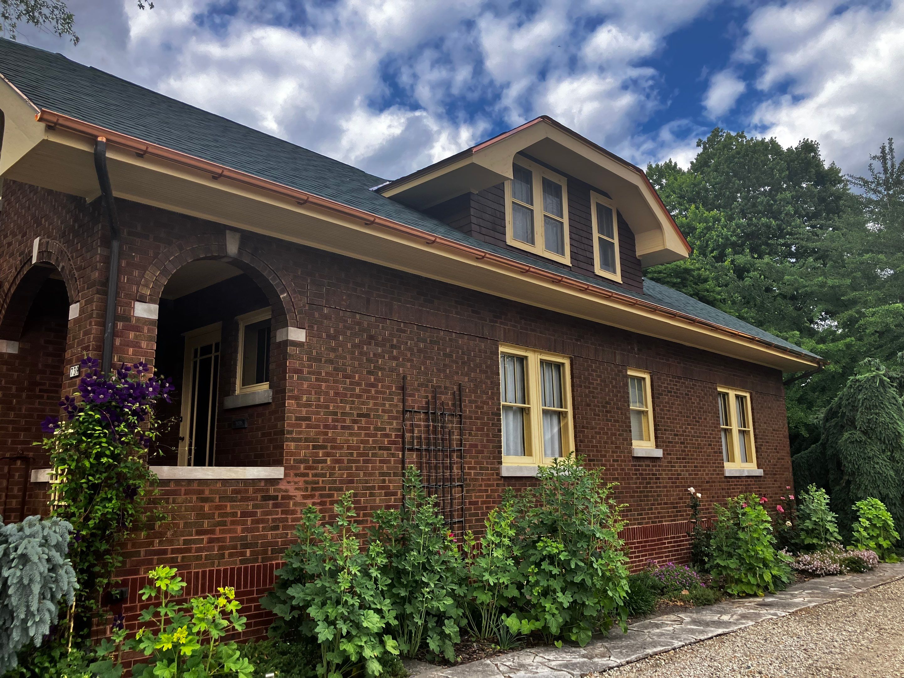 Asphalt Shingle Replacement and Half Round Copper Gutters Installation by Custom Installations, Inc.