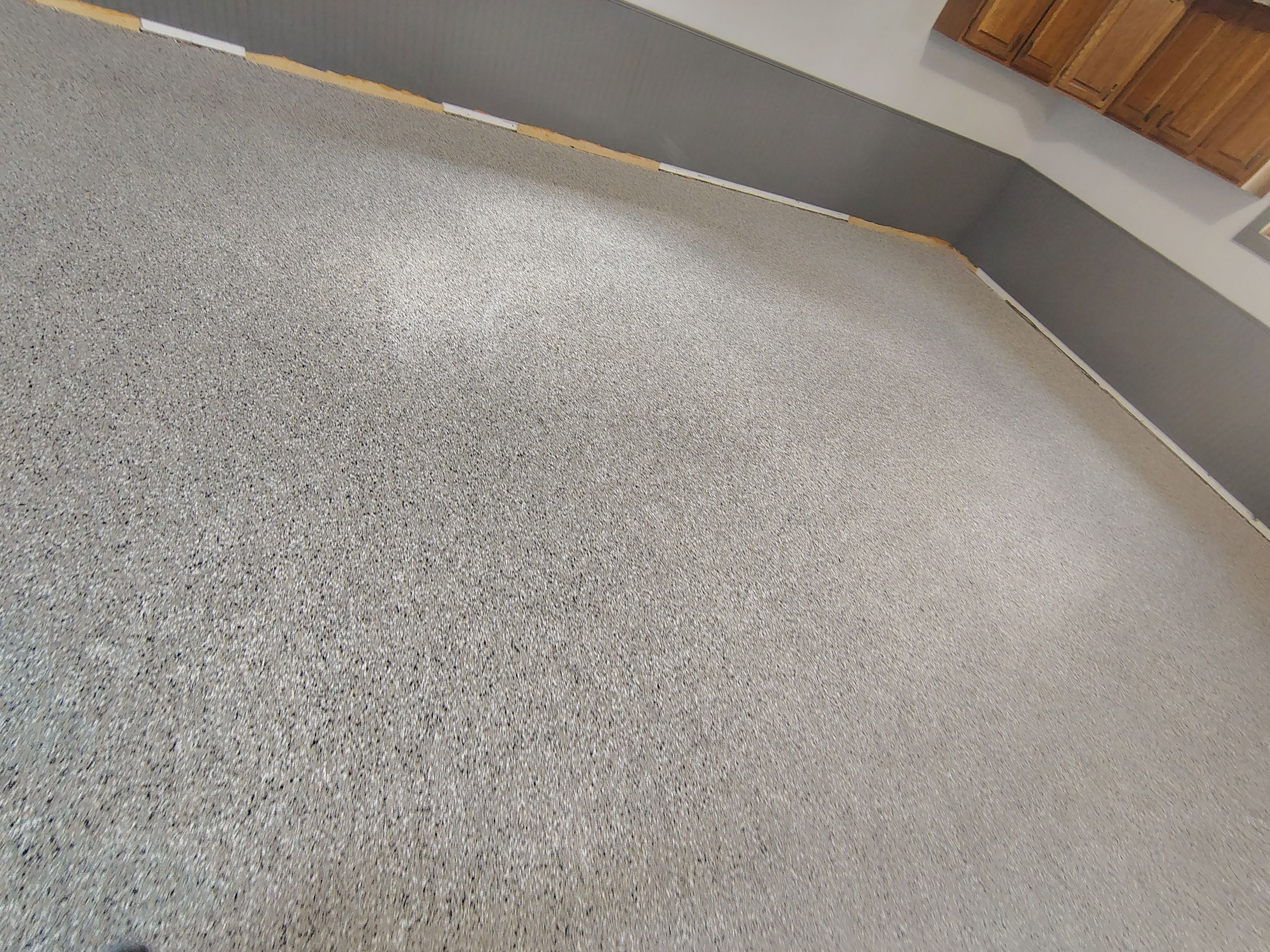 Multi-Fleck Epoxy Garage Floor Coating in Dell Rapids by Select Painting, Coatings & Garage Cabinets