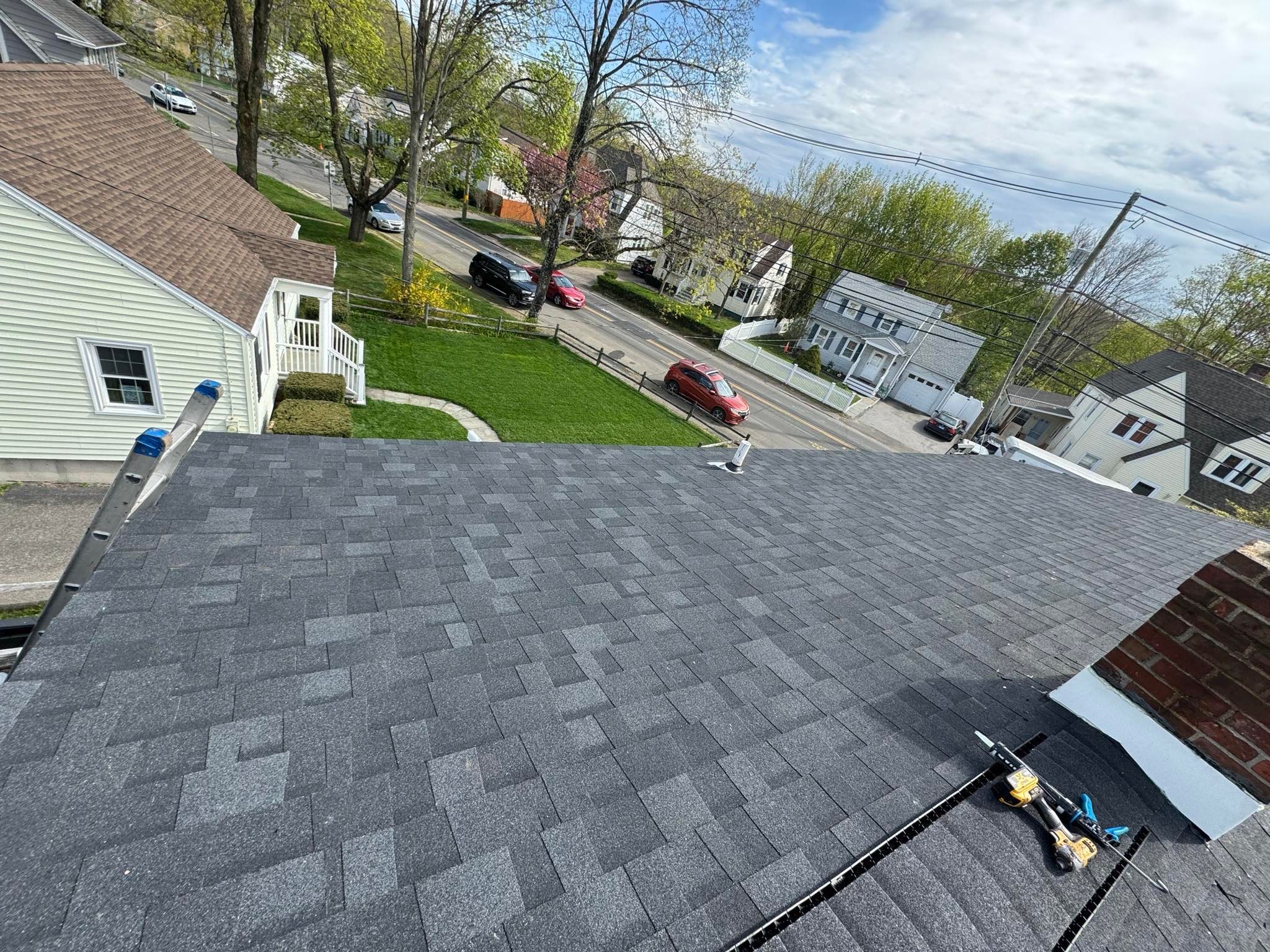 Charcoal Shingles by Reimagine Roofing