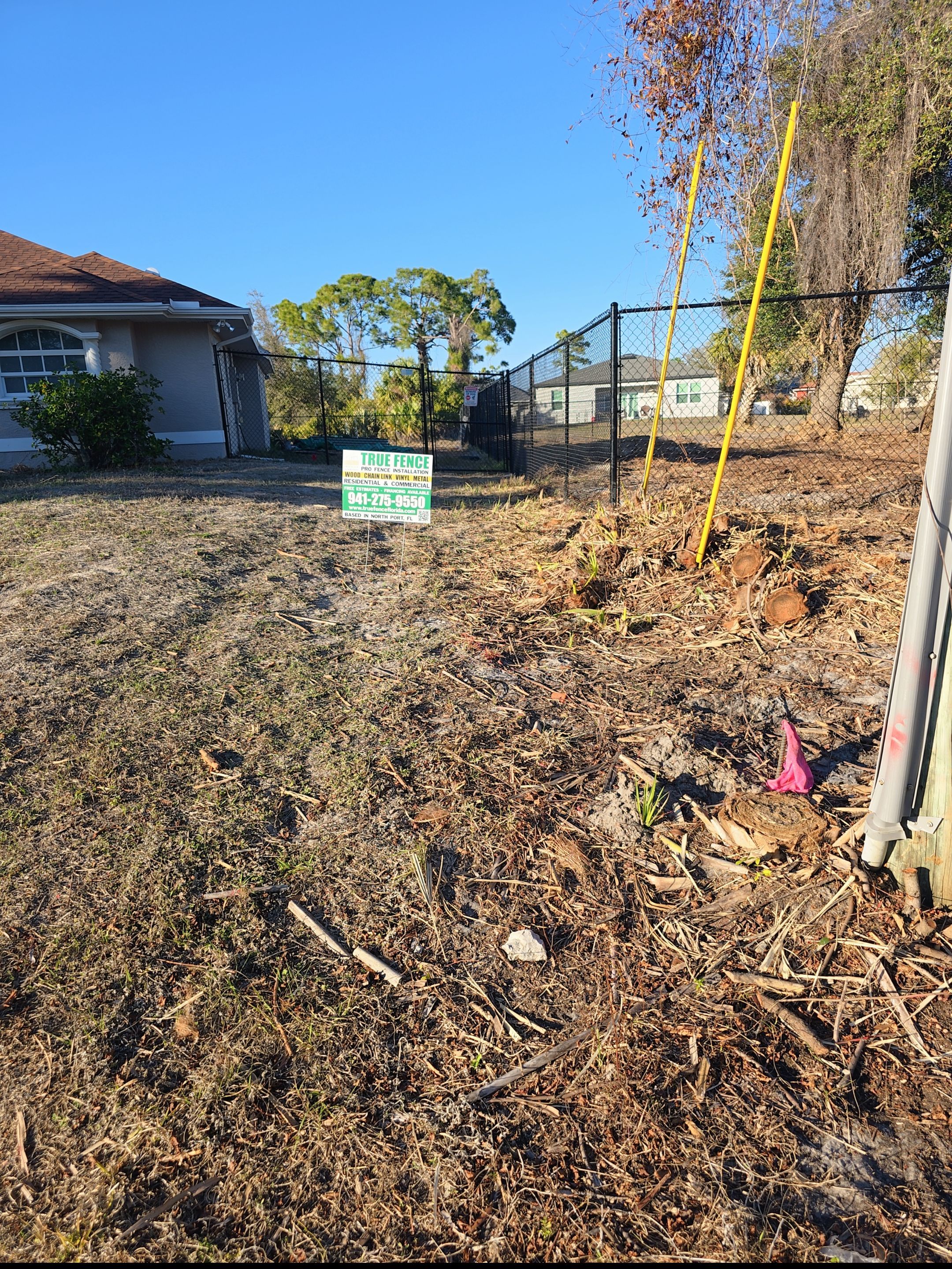 Black Vinyl-Coated Chain Link Fence and Gate Installation in North Port by True Fence LLC