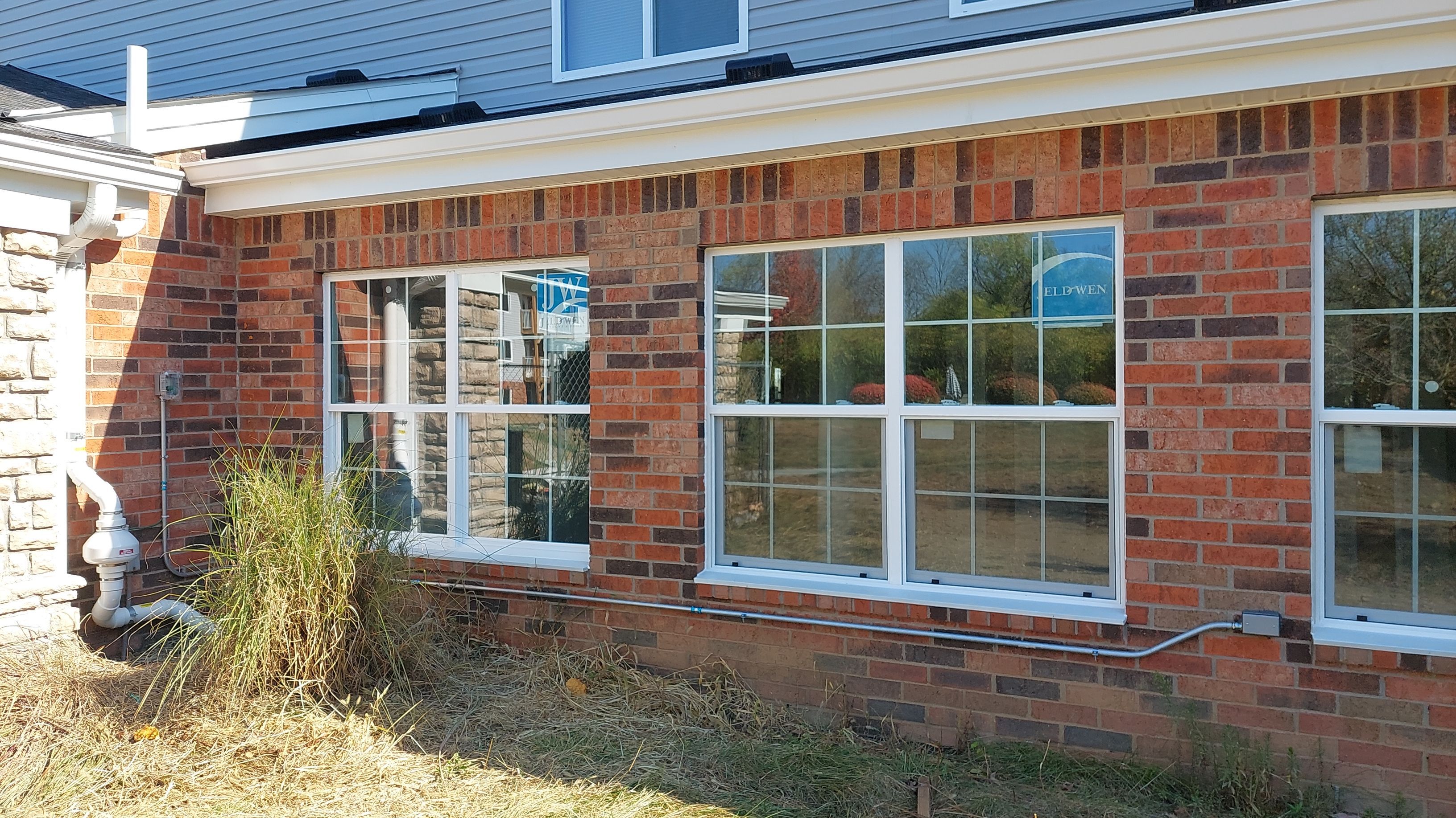 Roofing, windows, doors, siding by Tamlin Roofing