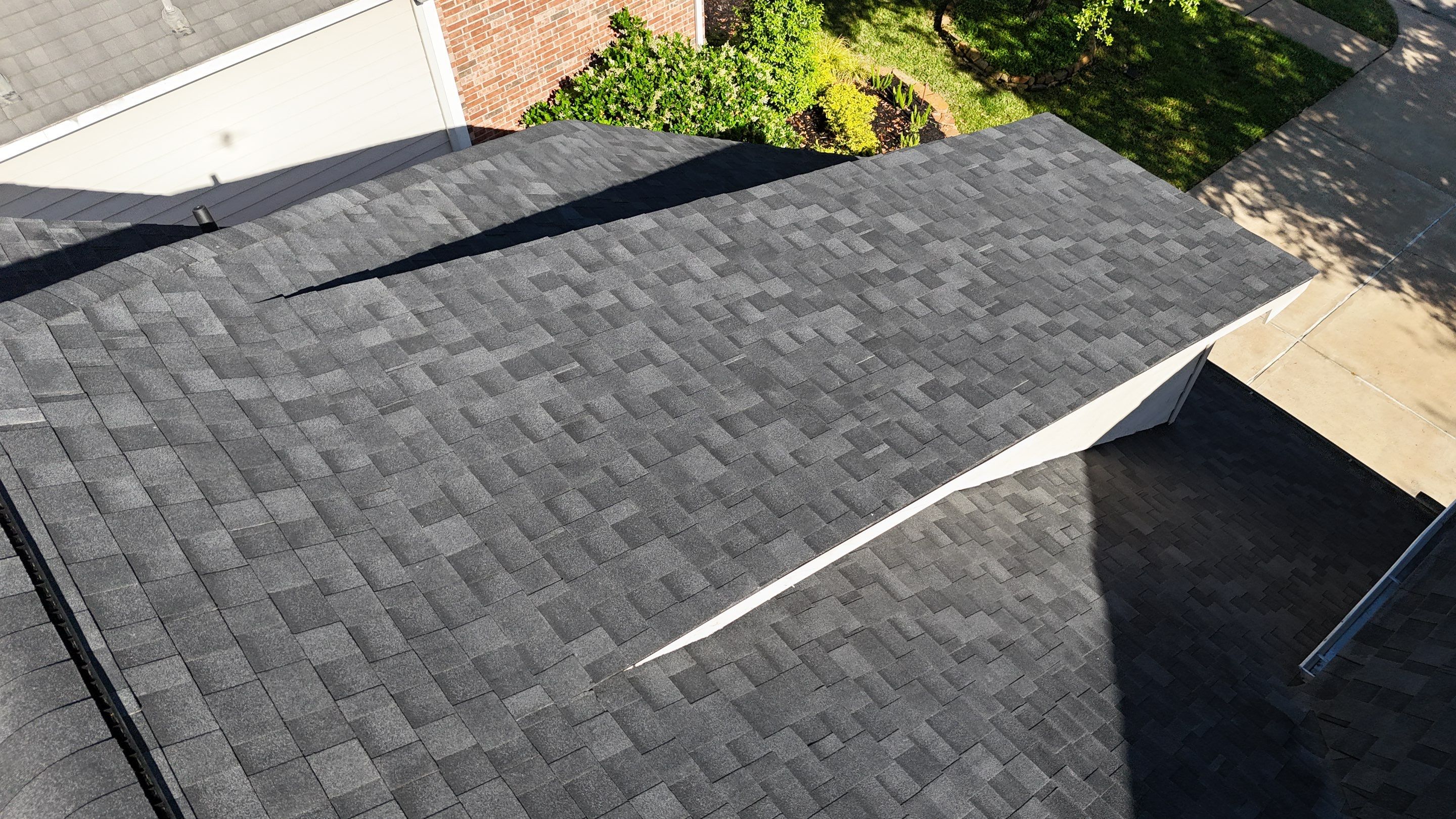 Residential Roofing Installation using Architectural Shingles by Core Four Roofing