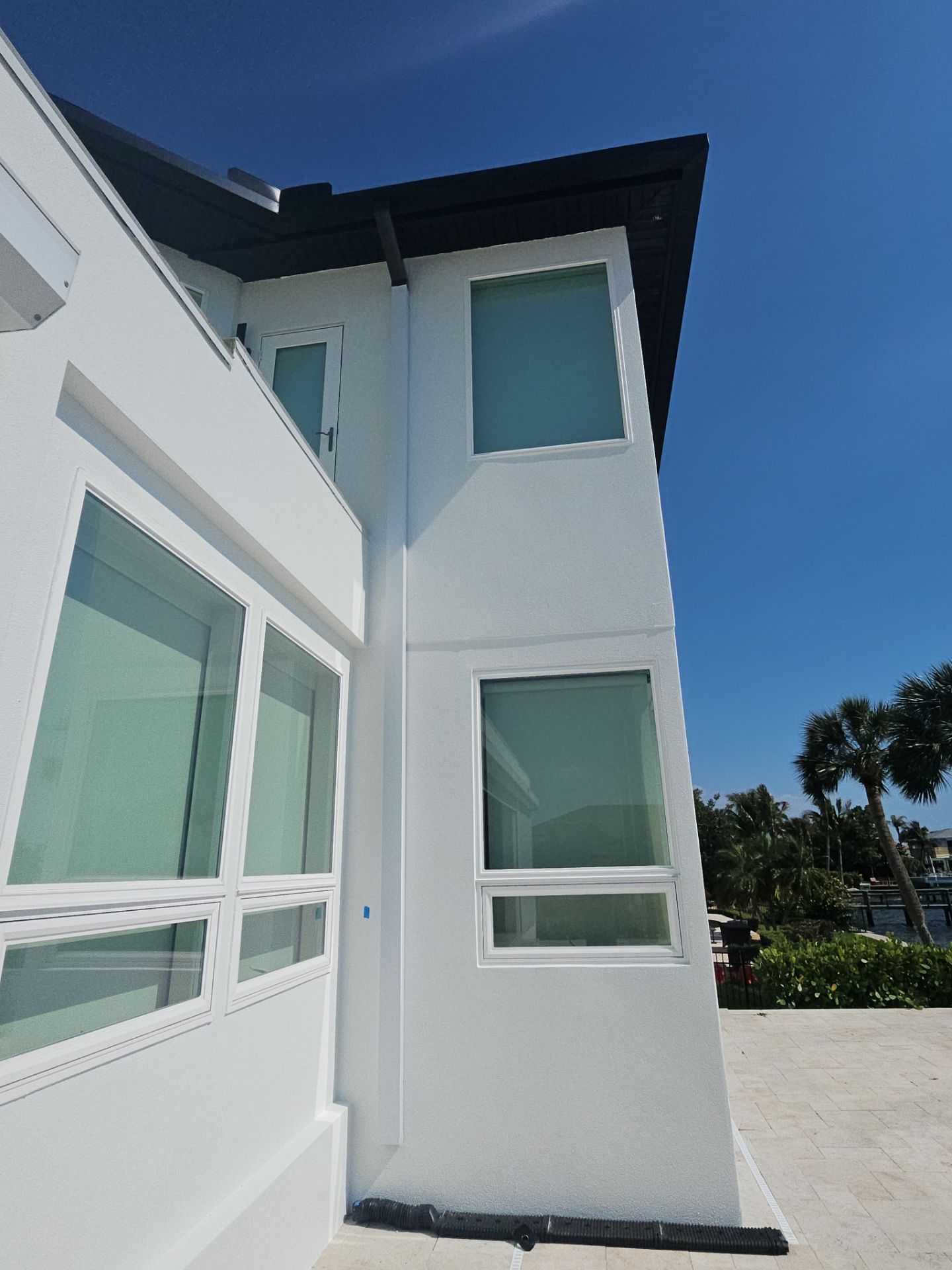 Soffit and Fascia Installation and black seamless gutters in Sarasota FL by Gutter Professors