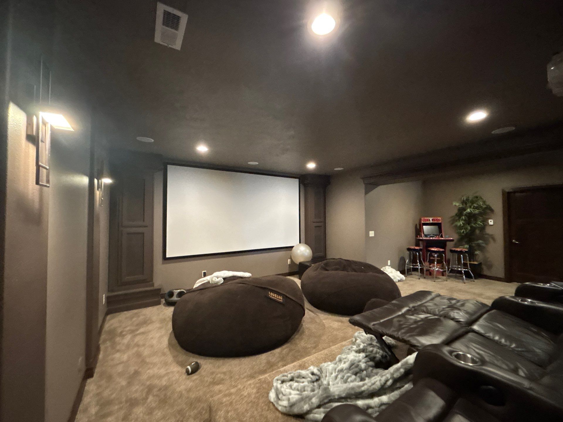 Custom Interior Painting for Basement Theater and Bedrooms in Sioux Falls by Select Painting, Coatings & Garage Cabinets