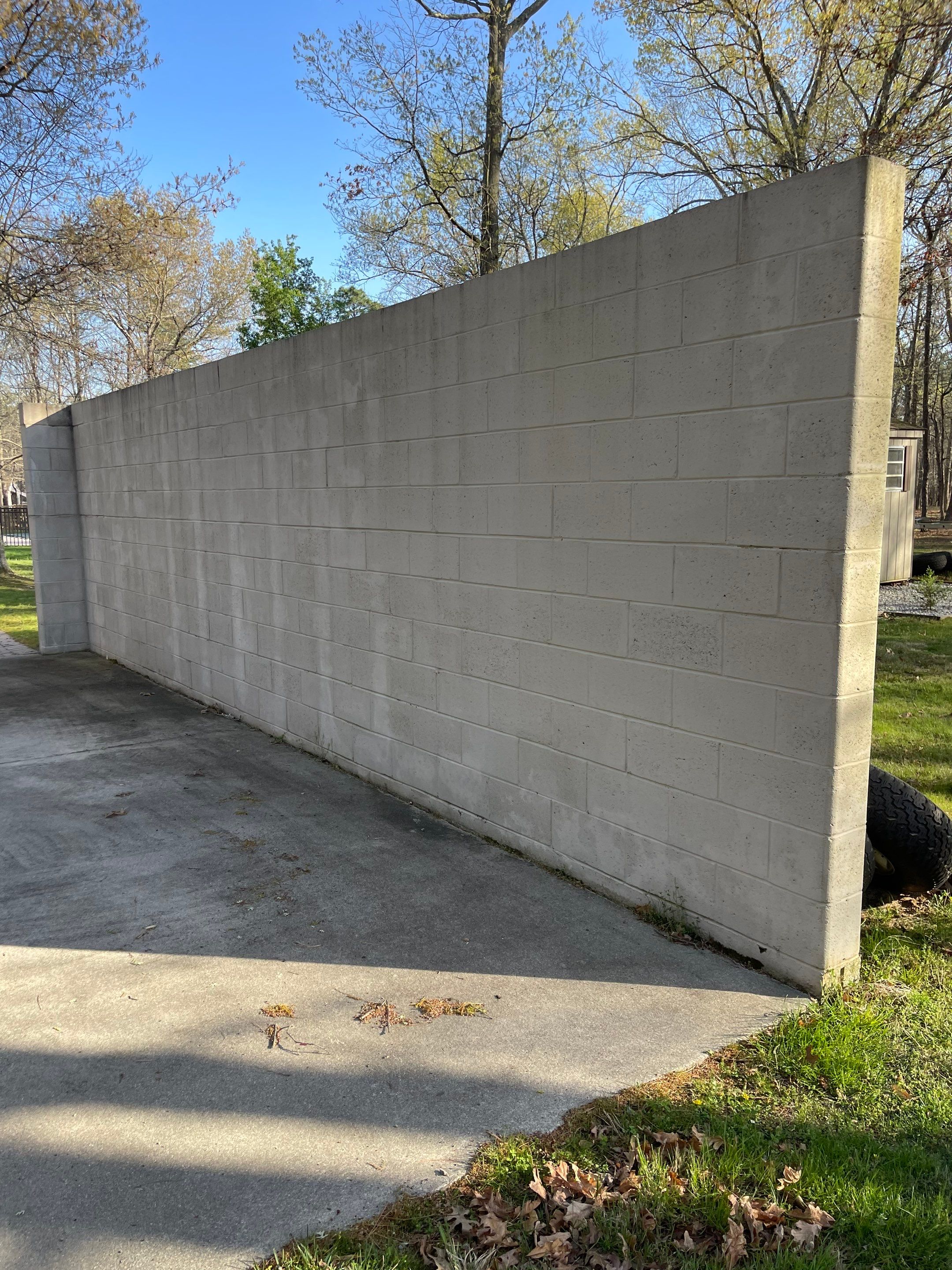 Pavers Cleaned, Garage and Concrete walls by SJ Exterior