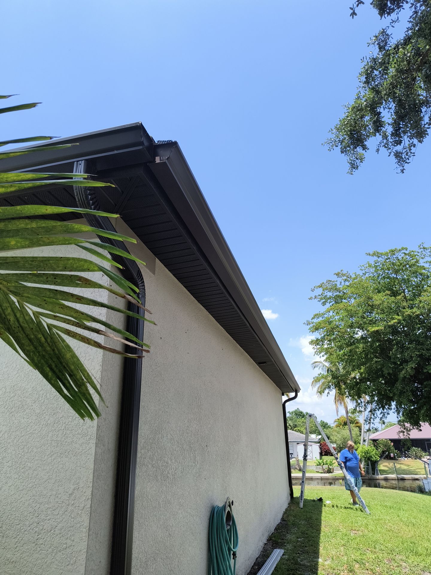 Custom Seamless Gutters and Downspouts for Large Homes in Tampa FL by Gutter Professor by Gutter Professors
