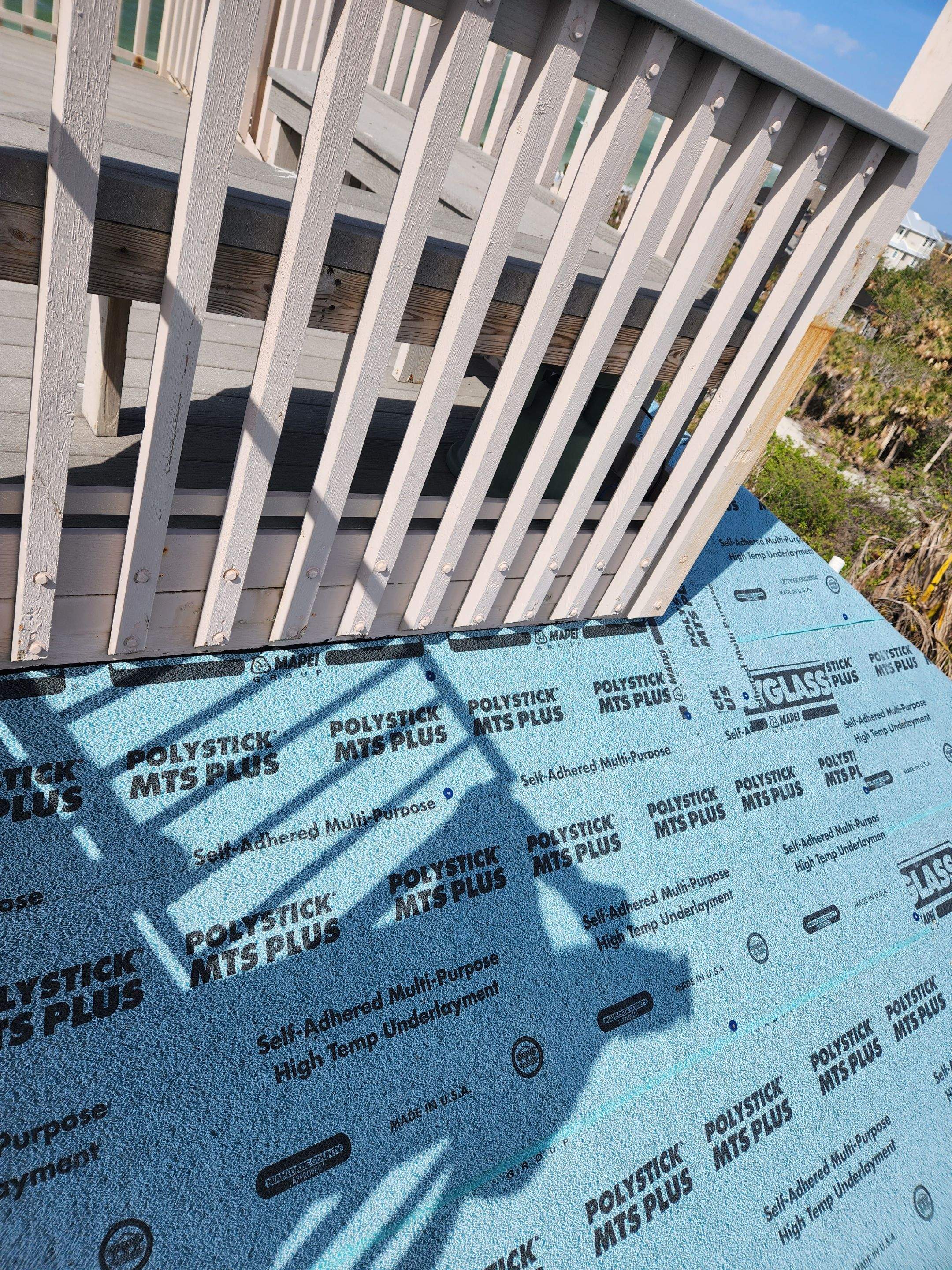 Residential Roofing Installation using Gulf Coast Metals Gulf Seam Panels by Four Peaks Roofing