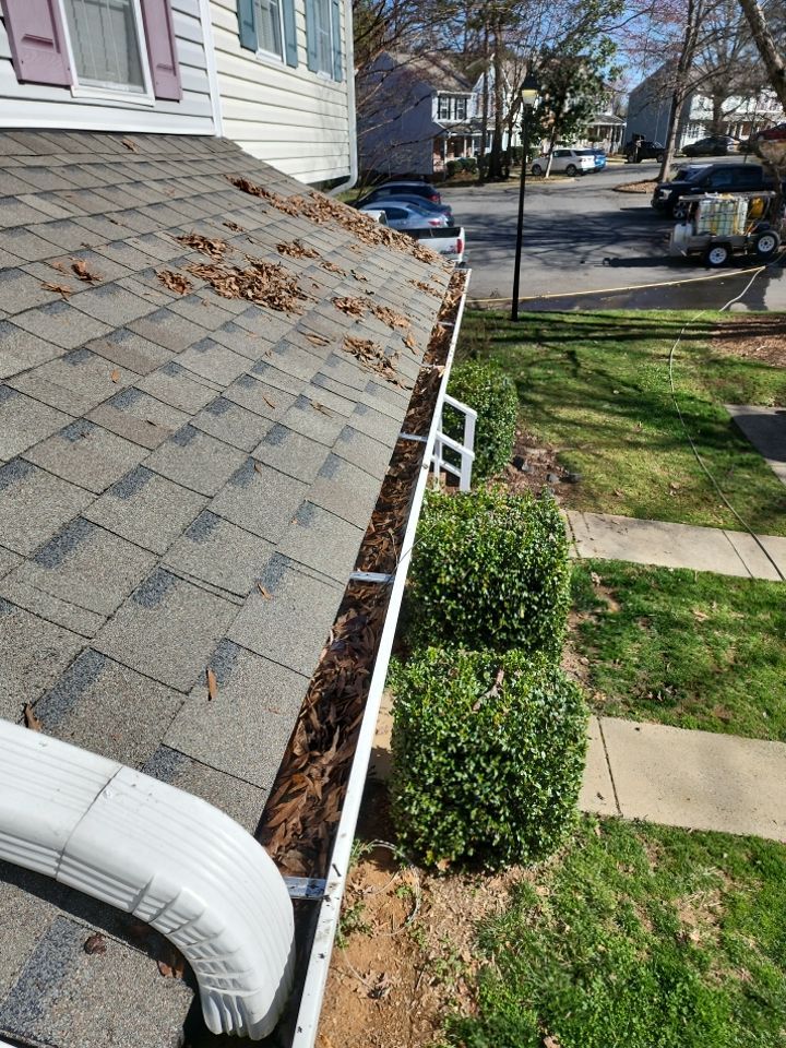 Gutter Cleaning using water by Power Wash Masters LLC