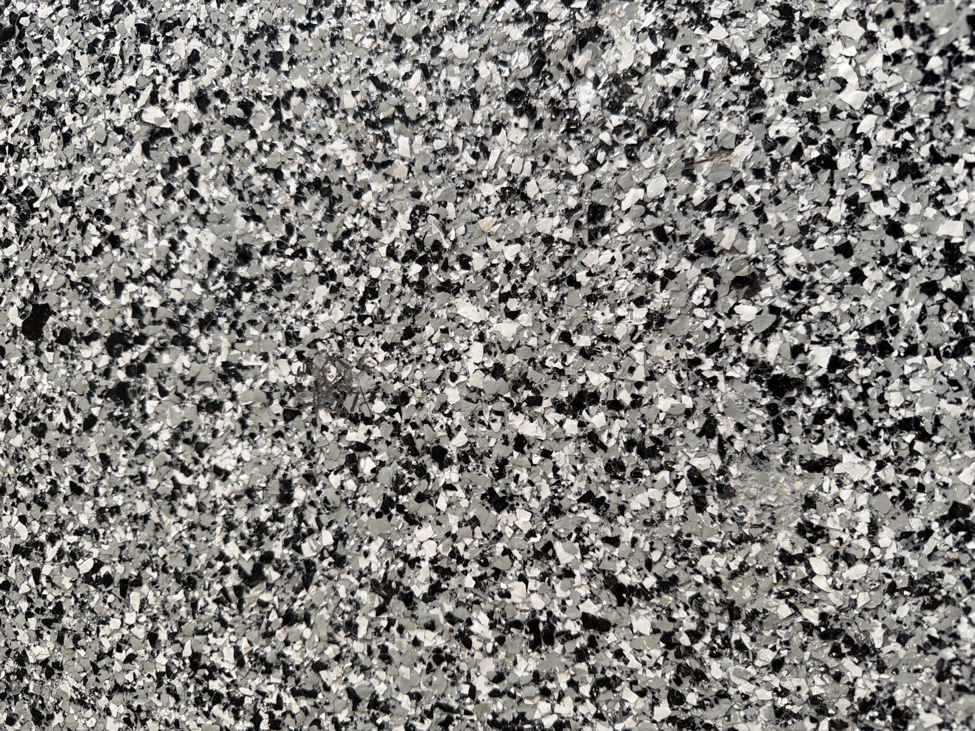 Concrete Patio Coating with Fuzzy Wool Finish in Sioux Falls by Select Painting, Coatings & Garage Cabinets