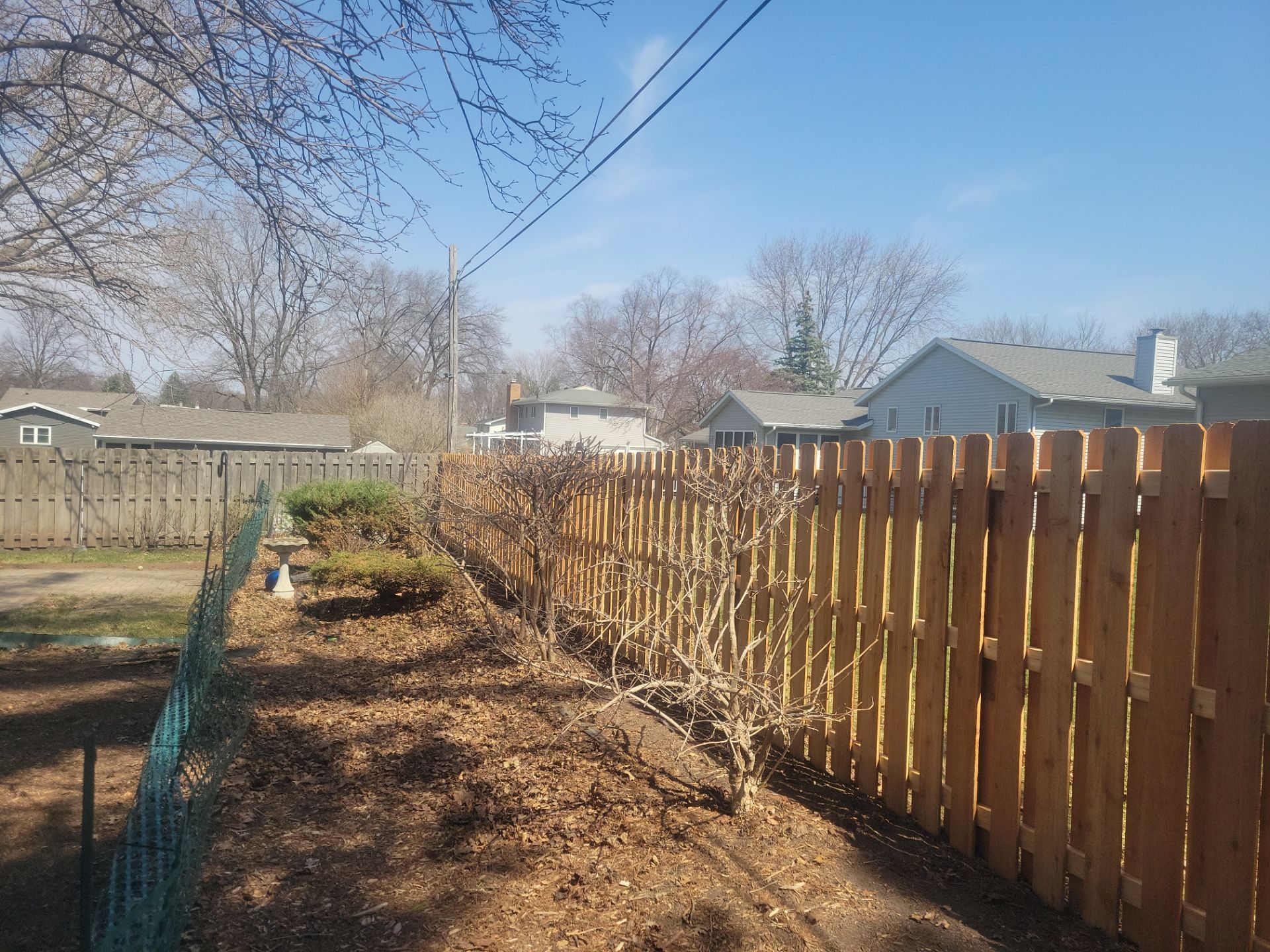 Cedar Shadowbox Wood Privacy Fence Installation in Cedar Falls by Perfect Picket Fence and Stain