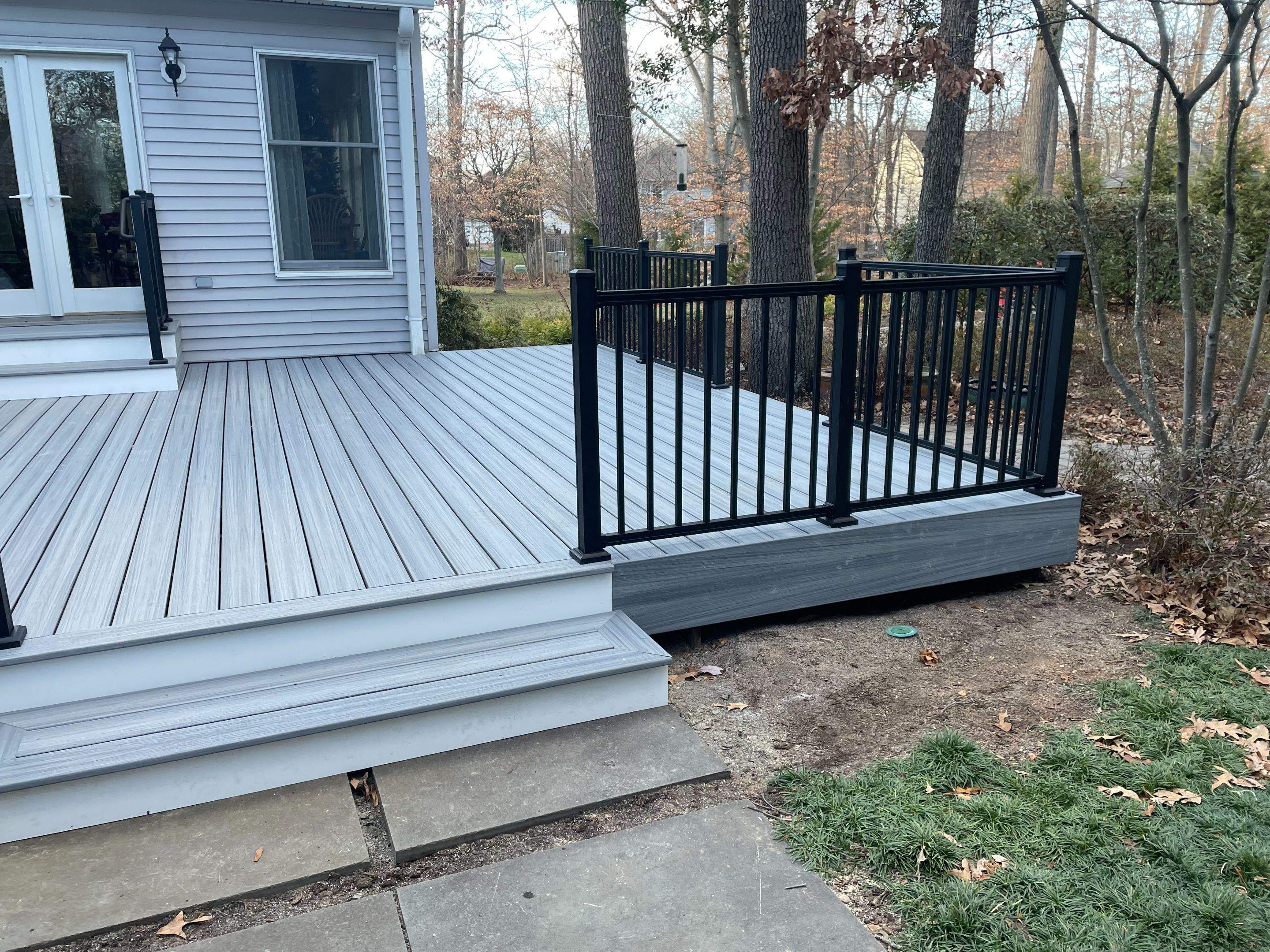Trex Deck Resurfacing & New Railing in Sterling, VA by Sunburst Construction Inc