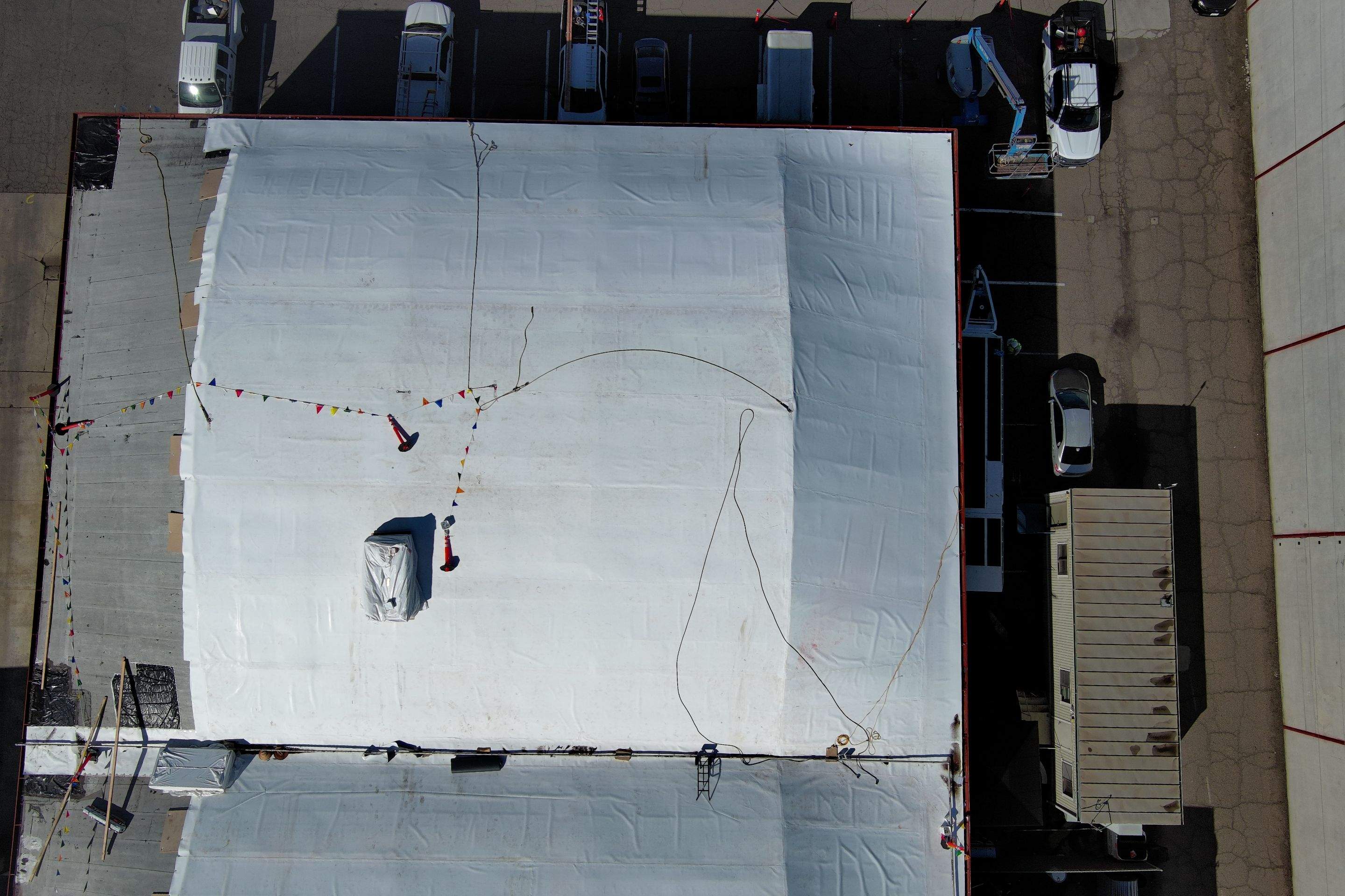 TPO single-ply roofing system using GAF Single-ply TPO 60 mil with 1.5 inch ISO board insulation by Straight Edge Roofing Inc