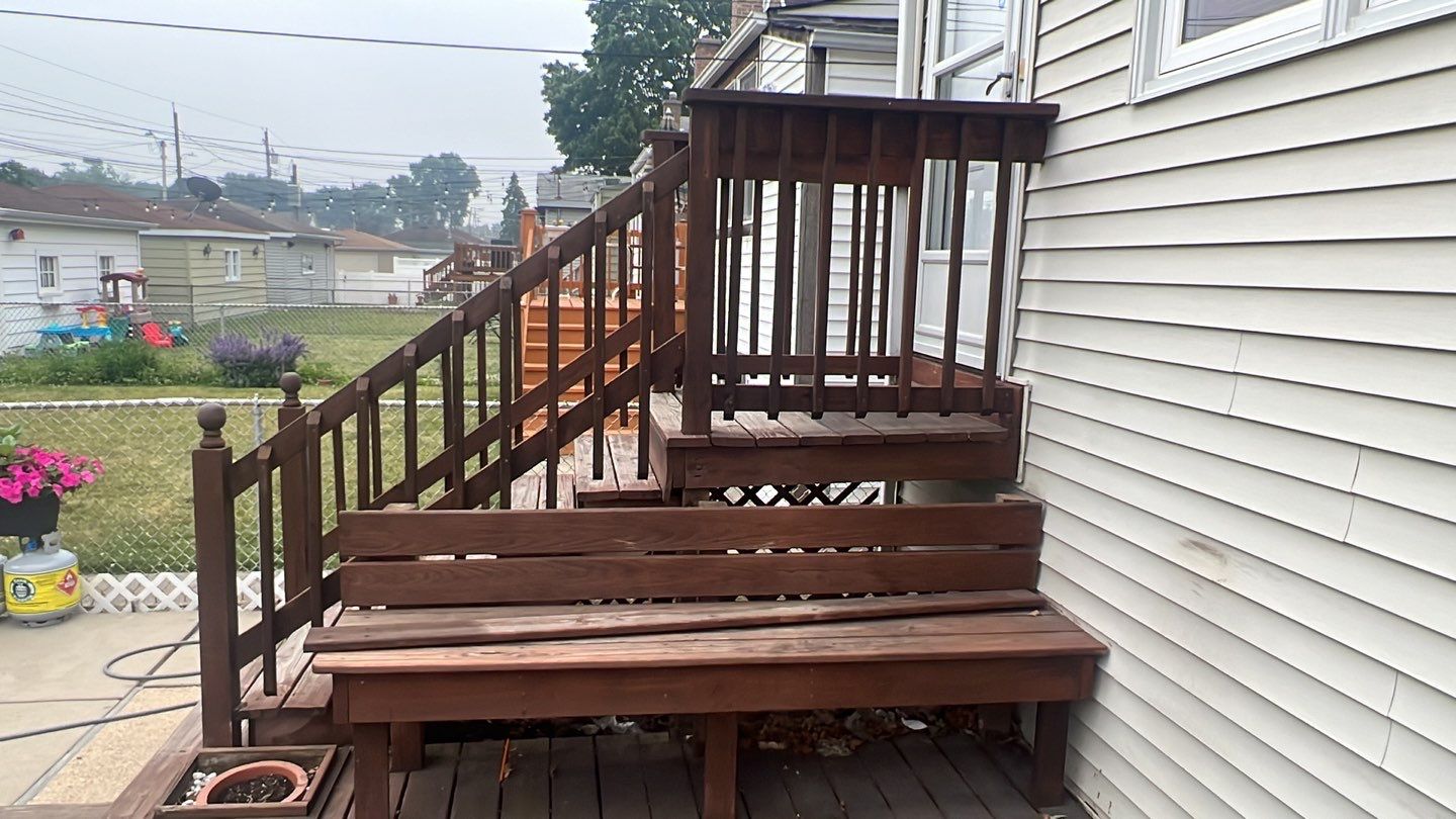 Wood cleaning and staining using Armstrong cloark oil stain by Northern Power Washing LLC.