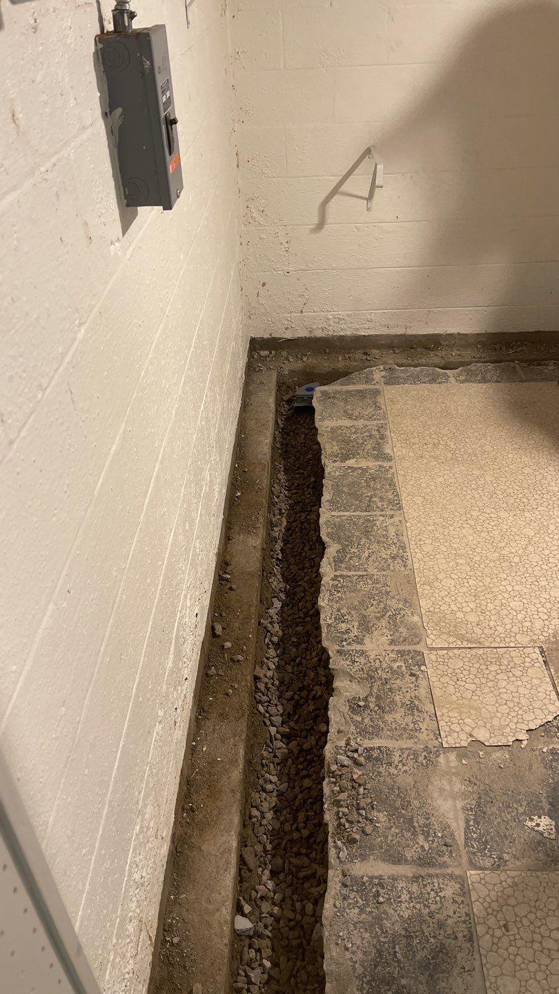 Interior Waterproofing Using GrateDrain™ Products by Toledo Basement Repair