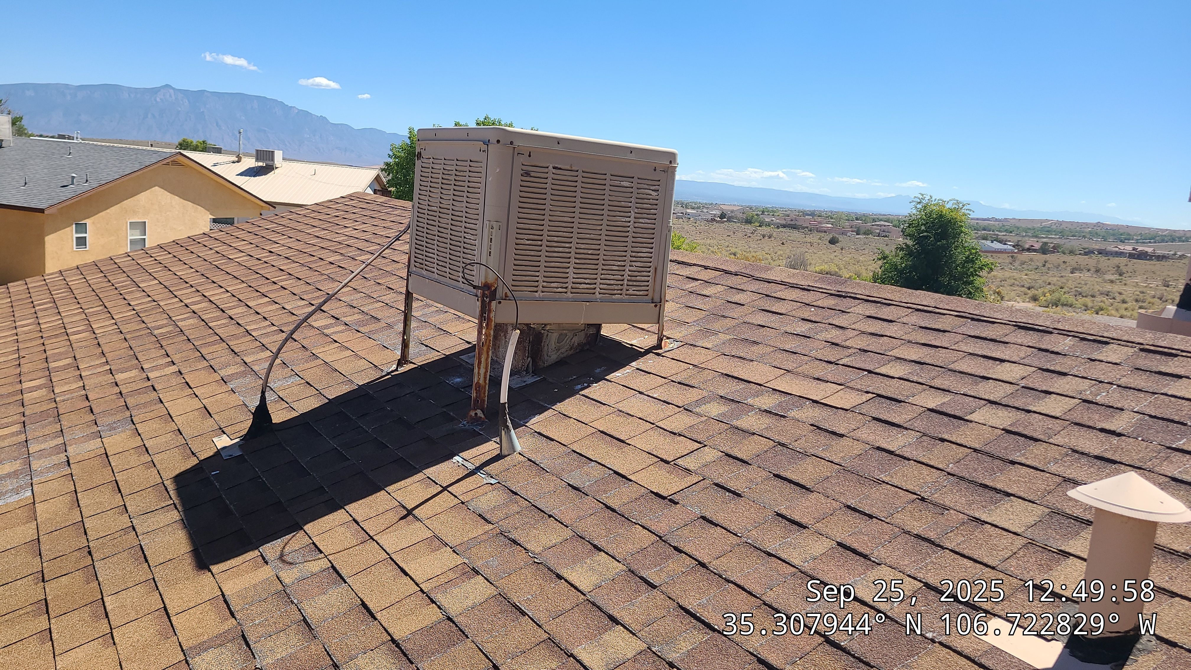 Oakridge Desert tan shingles in Chimayo Meadows by Doyle Roof Masters Inc