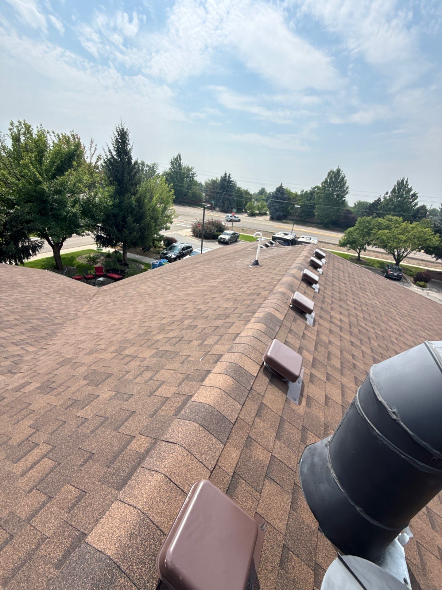 Boise Commercial Roof Replacement with Brown Architectural Shingles by Olive Roofing