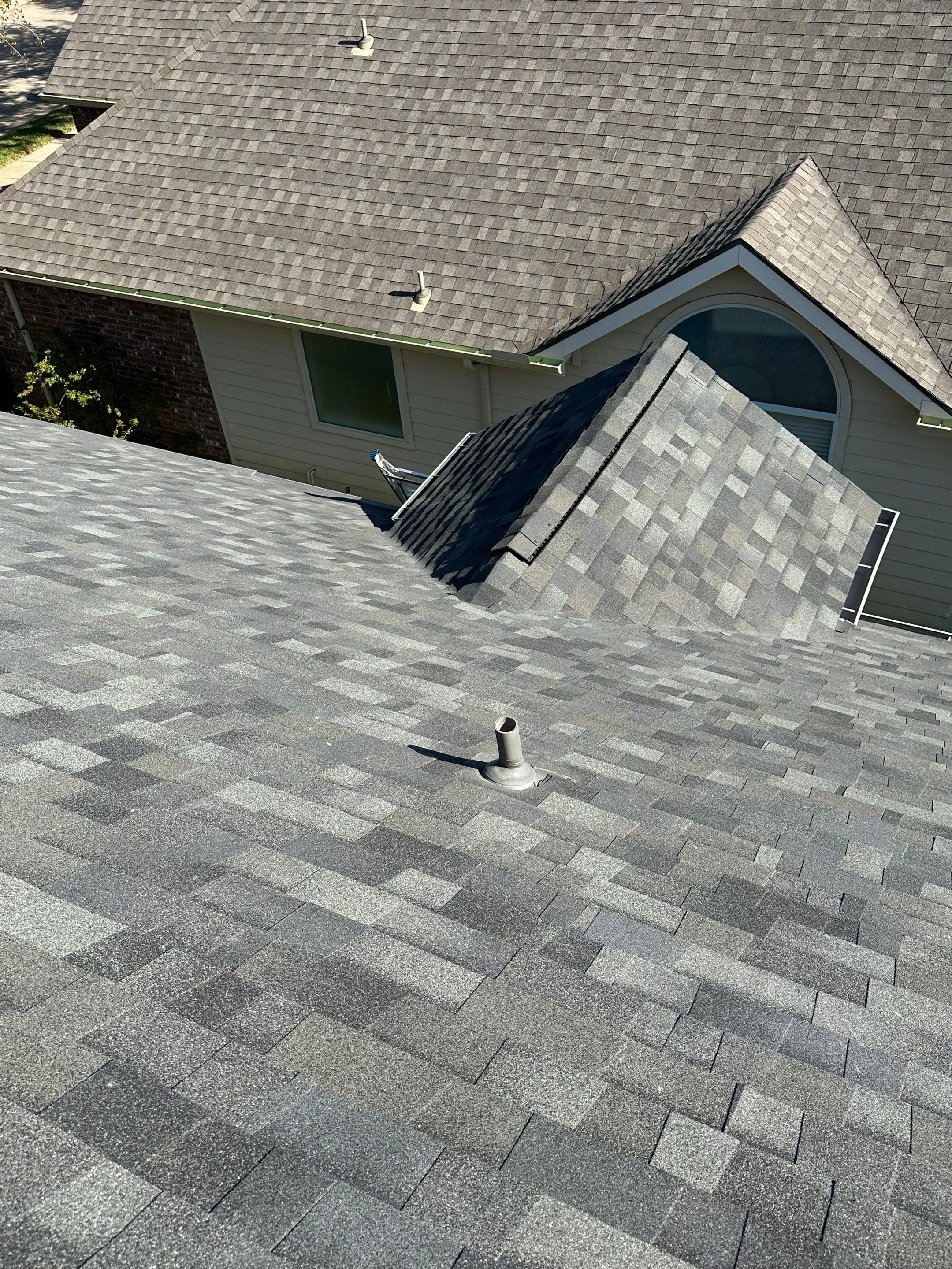Residential Roofing Installation using Malarkey Vista Storm Grey by OneSource Roofing and Restoration