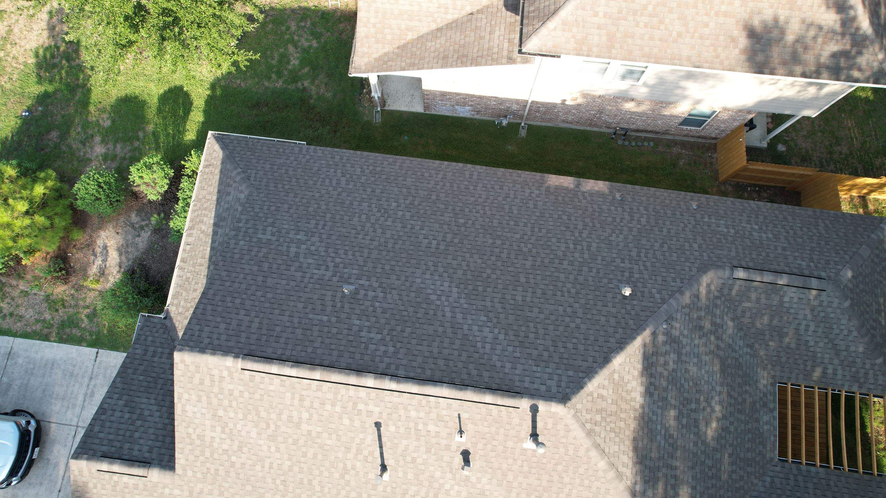 Roof Replacement on a Wooded Lot — Spring, TX by PL Roofing & SB Roofing, LLC.
