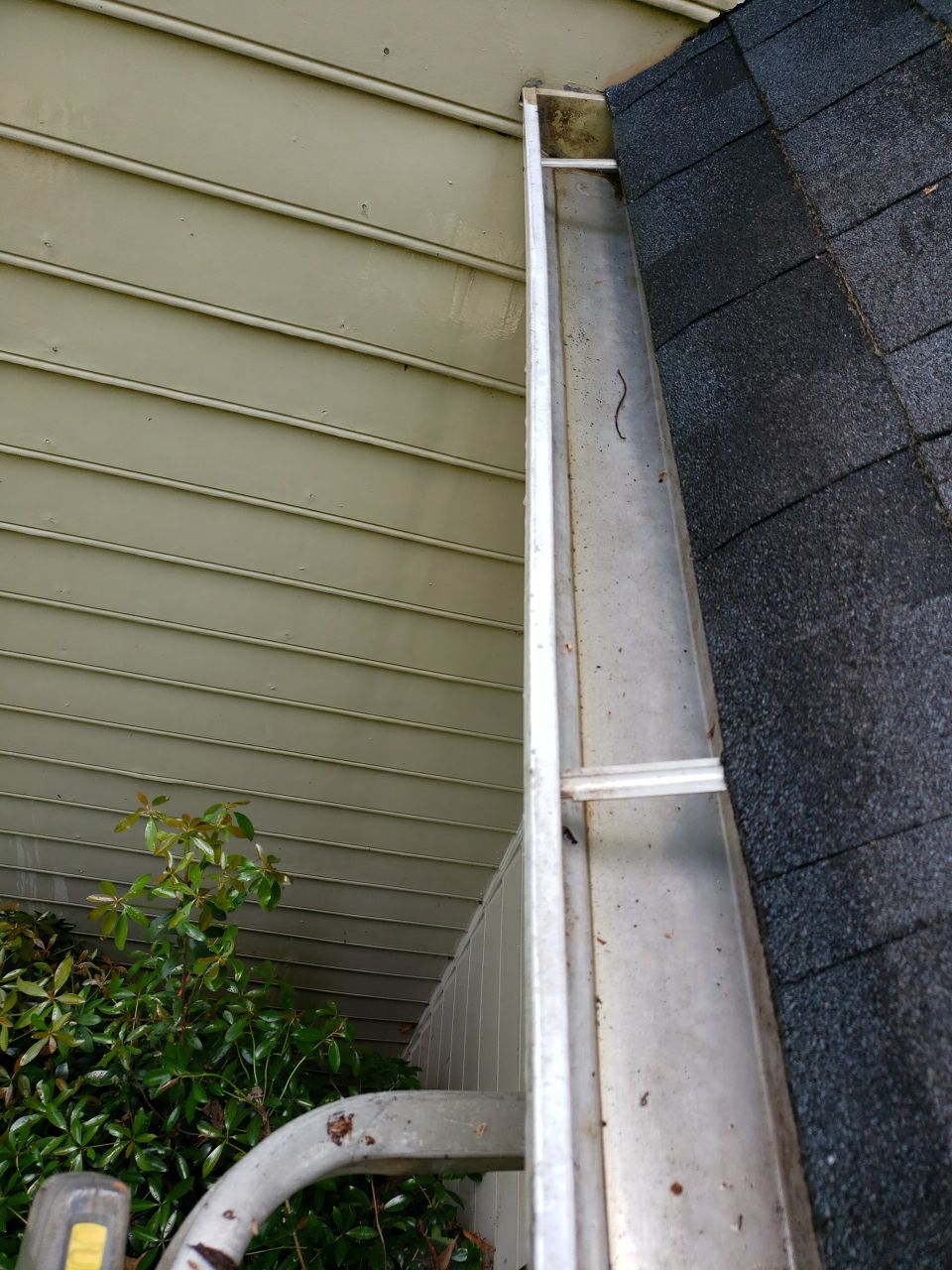 Gutter Cleaning using water by Power Wash Masters LLC