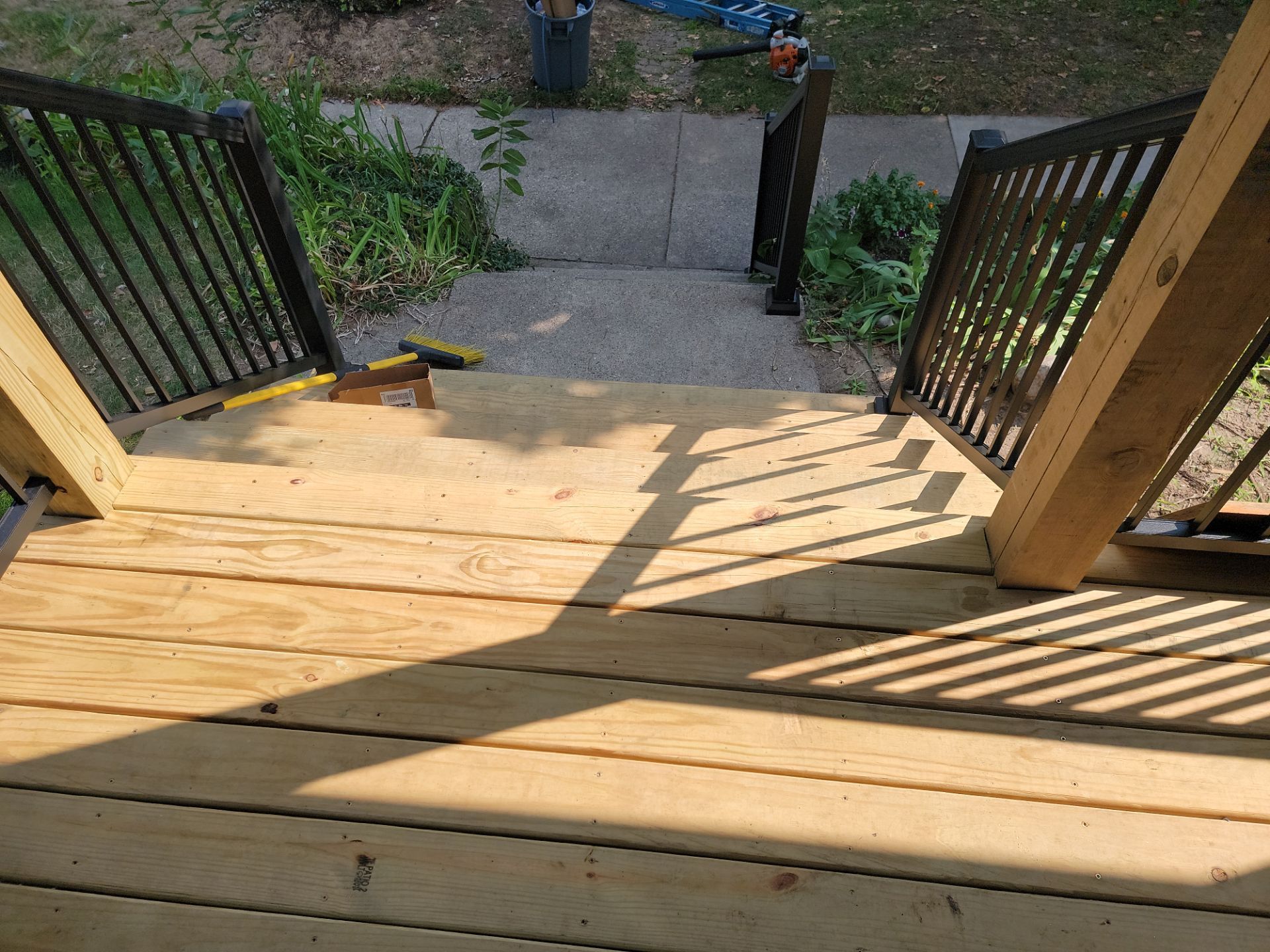 SIDING, DECK AND NEW PORCH  by Avalon Roofing and Exteriors