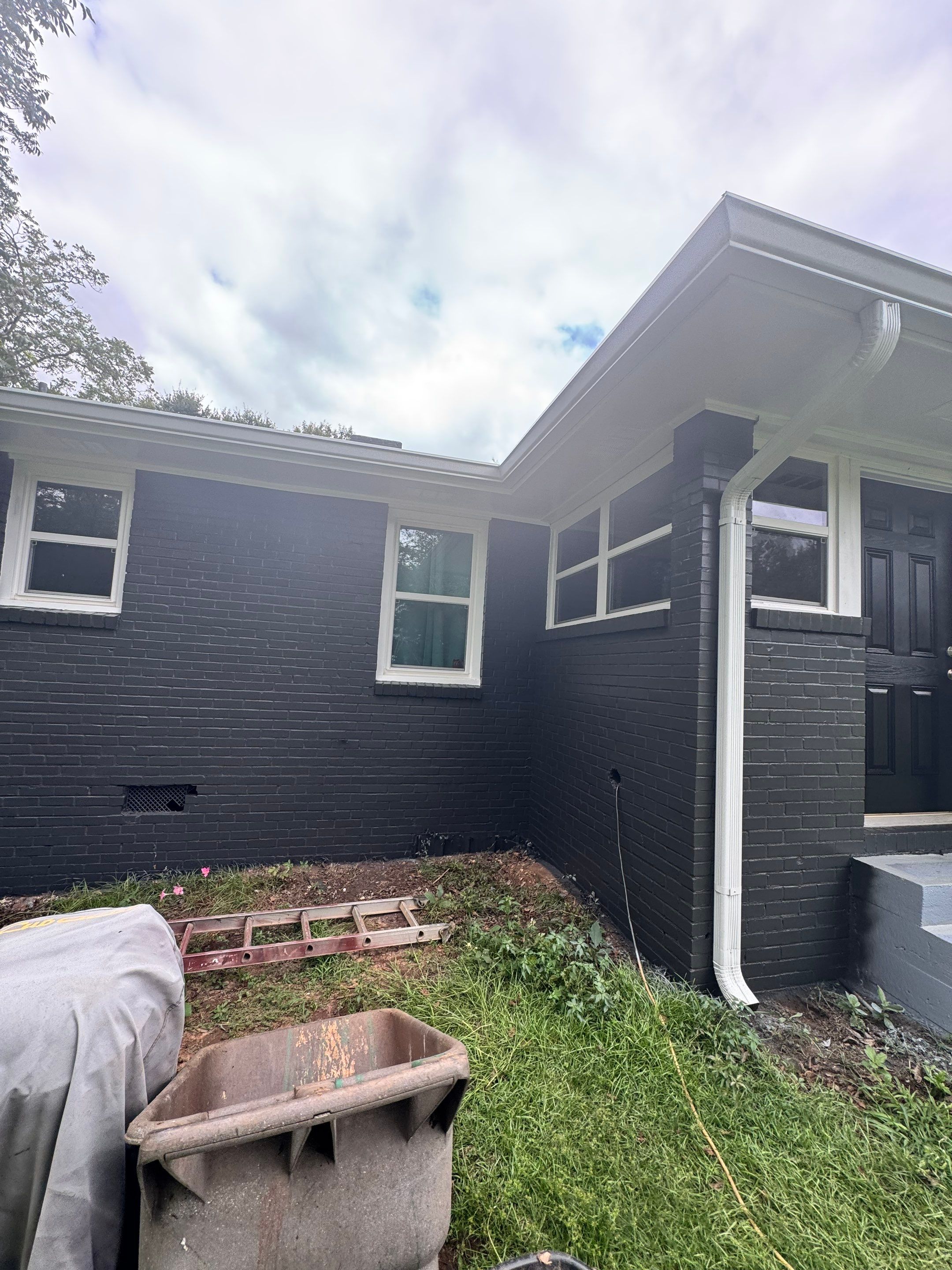 Social Circle Masonry Transformation with Dark Charcoal Exterior Painting by PGP Surface Solutions, LLC