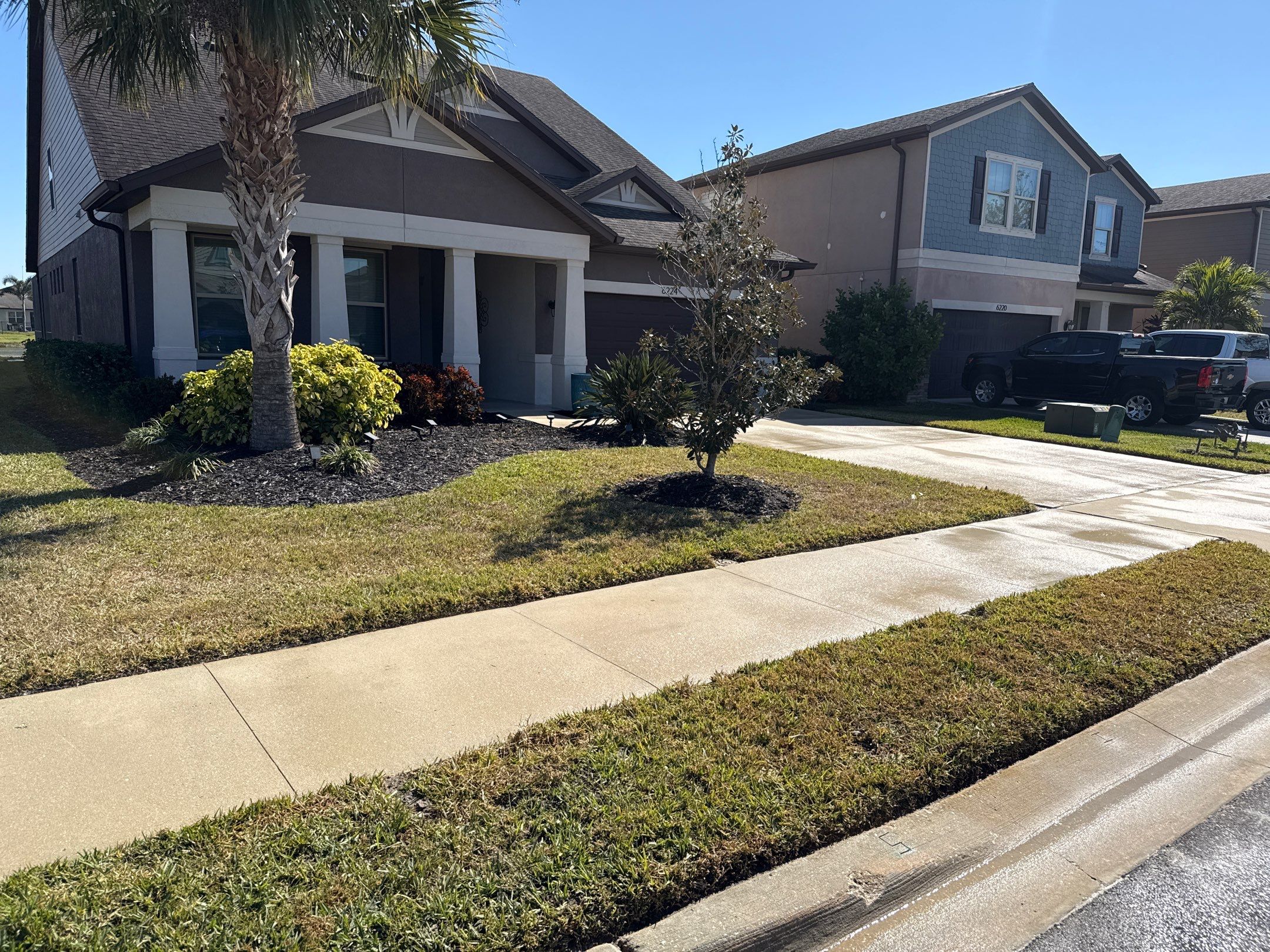2-Car Concrete Driveway & Sidewalk Cleaning in Trevesta – Palmetto, FL by Sunshine AquaWash