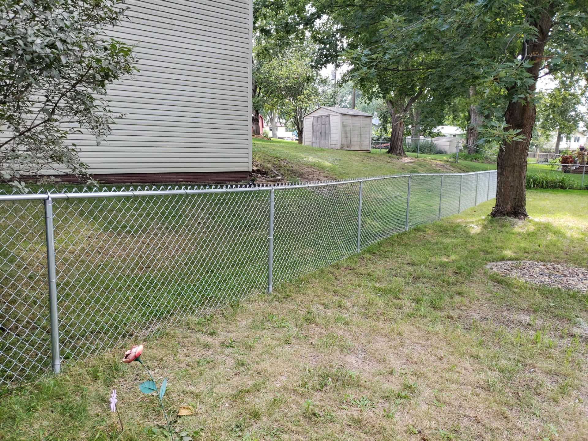 Galvanized Chain Link Backyard Fence and Gate Installation in Cedar Falls by Perfect Picket Fence and Stain