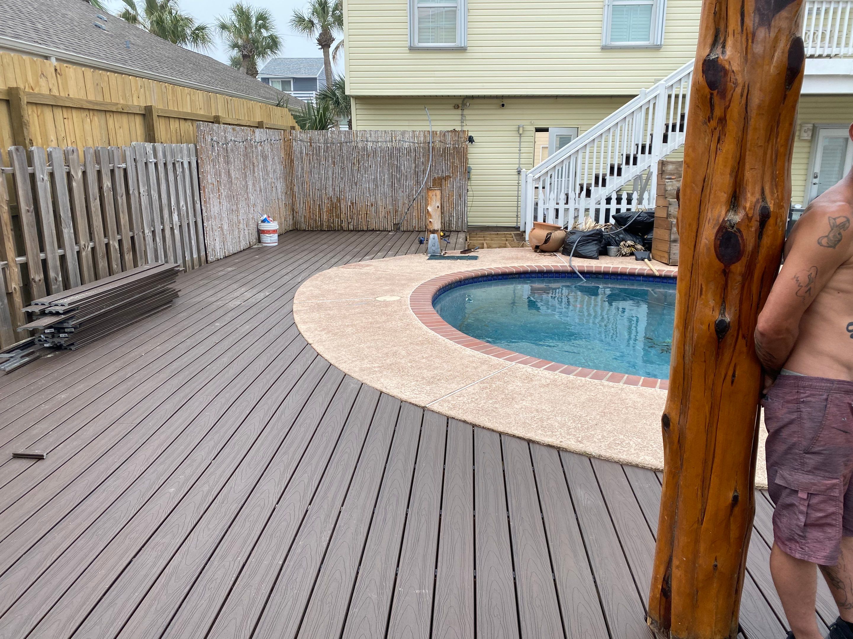 Poolside paradise by Bayfront Roofing and Construction