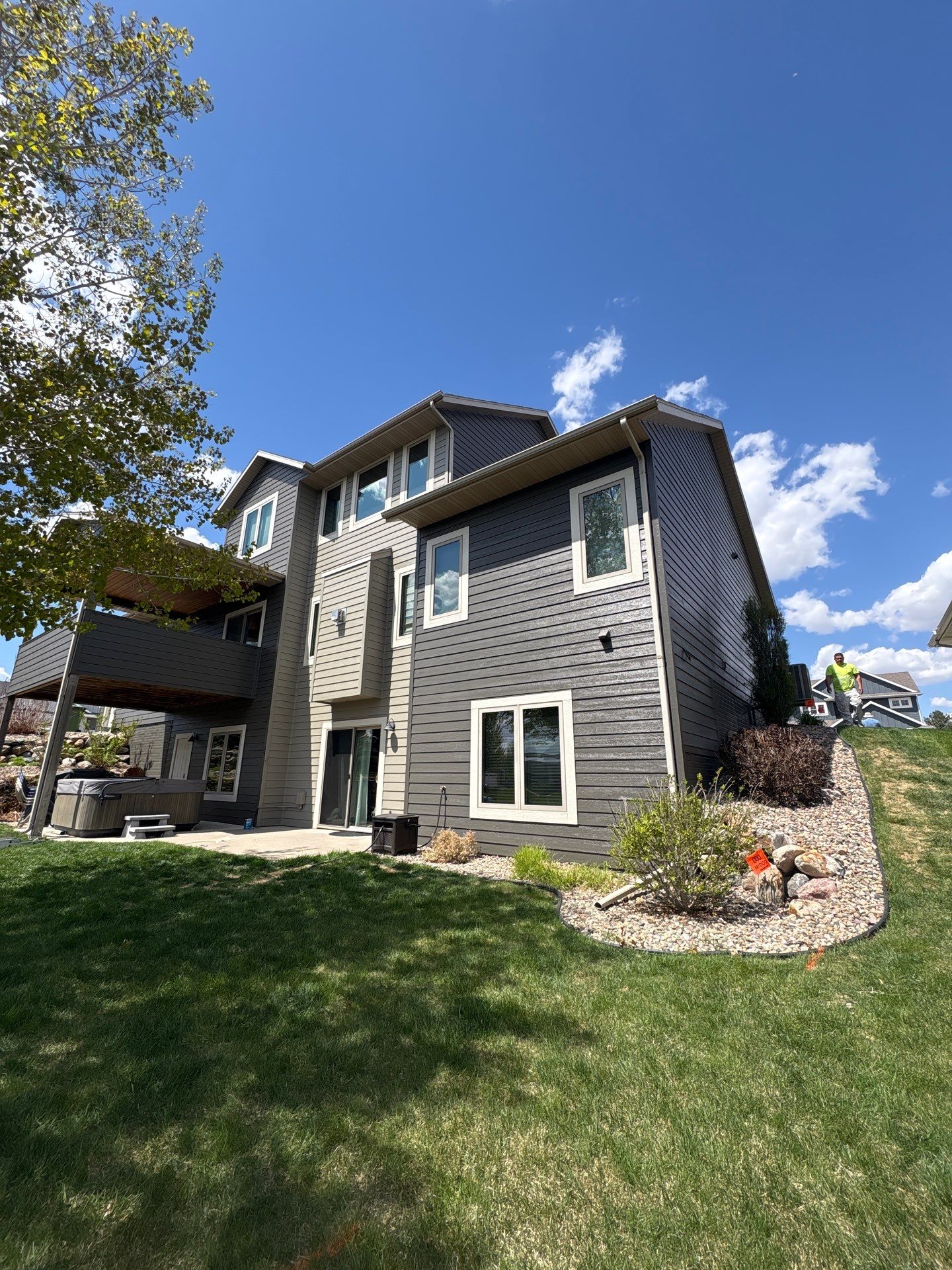 Residential Exterior Painting and Color Update in Sioux Falls by Select Painting, Coatings & Garage Cabinets