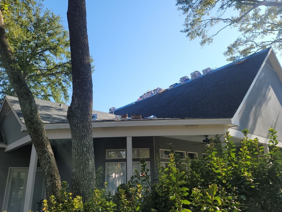Residential Roofing Installation using Roof Replacement by American Roofing & Construction LLC
