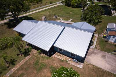 Standing Seam Metal Roof Replacement and Gutter Installation in Merritt Island
