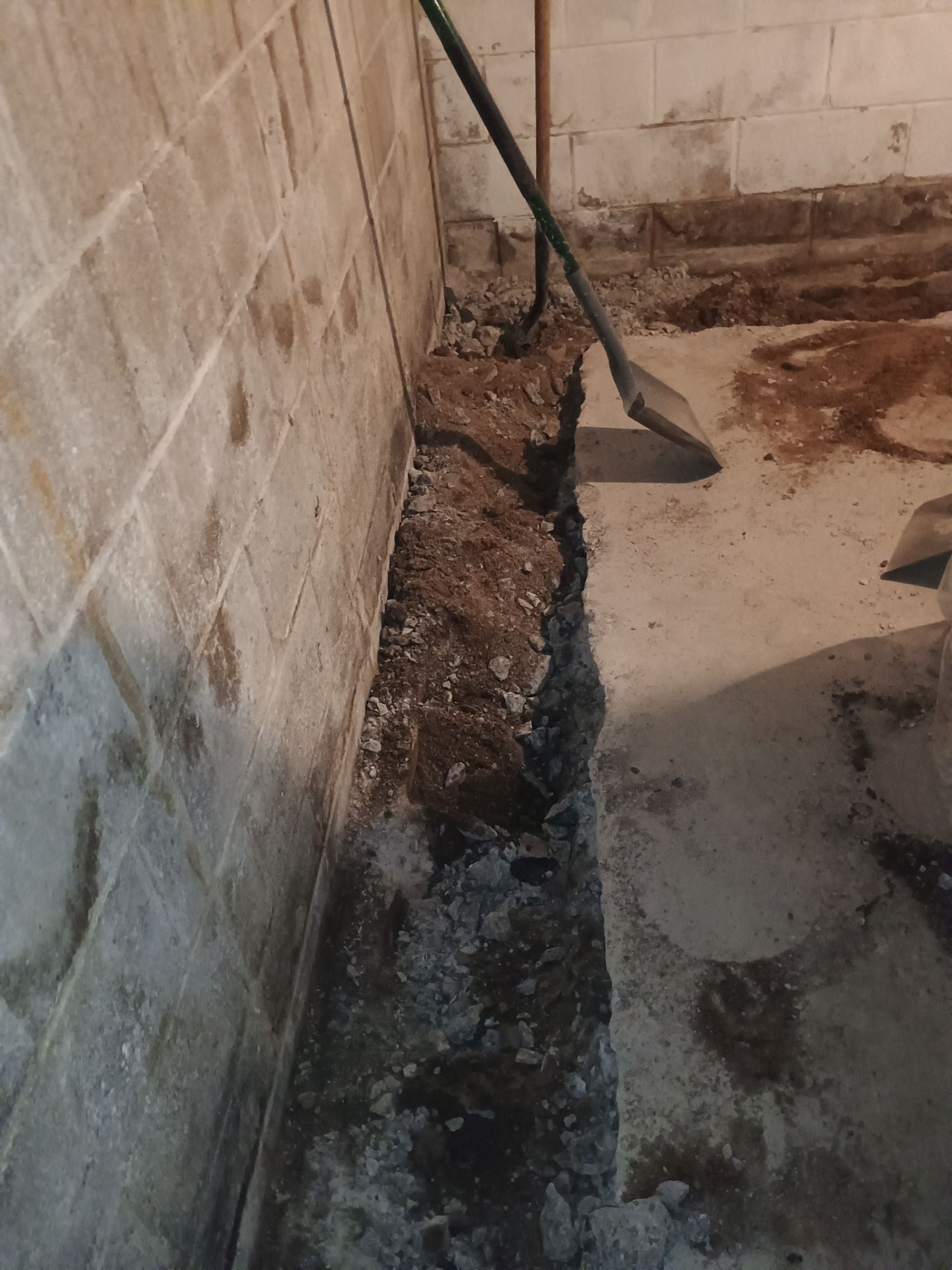 Interior Drain Tile Installation near Columbia Heights, MN by Waterproofing Northeast