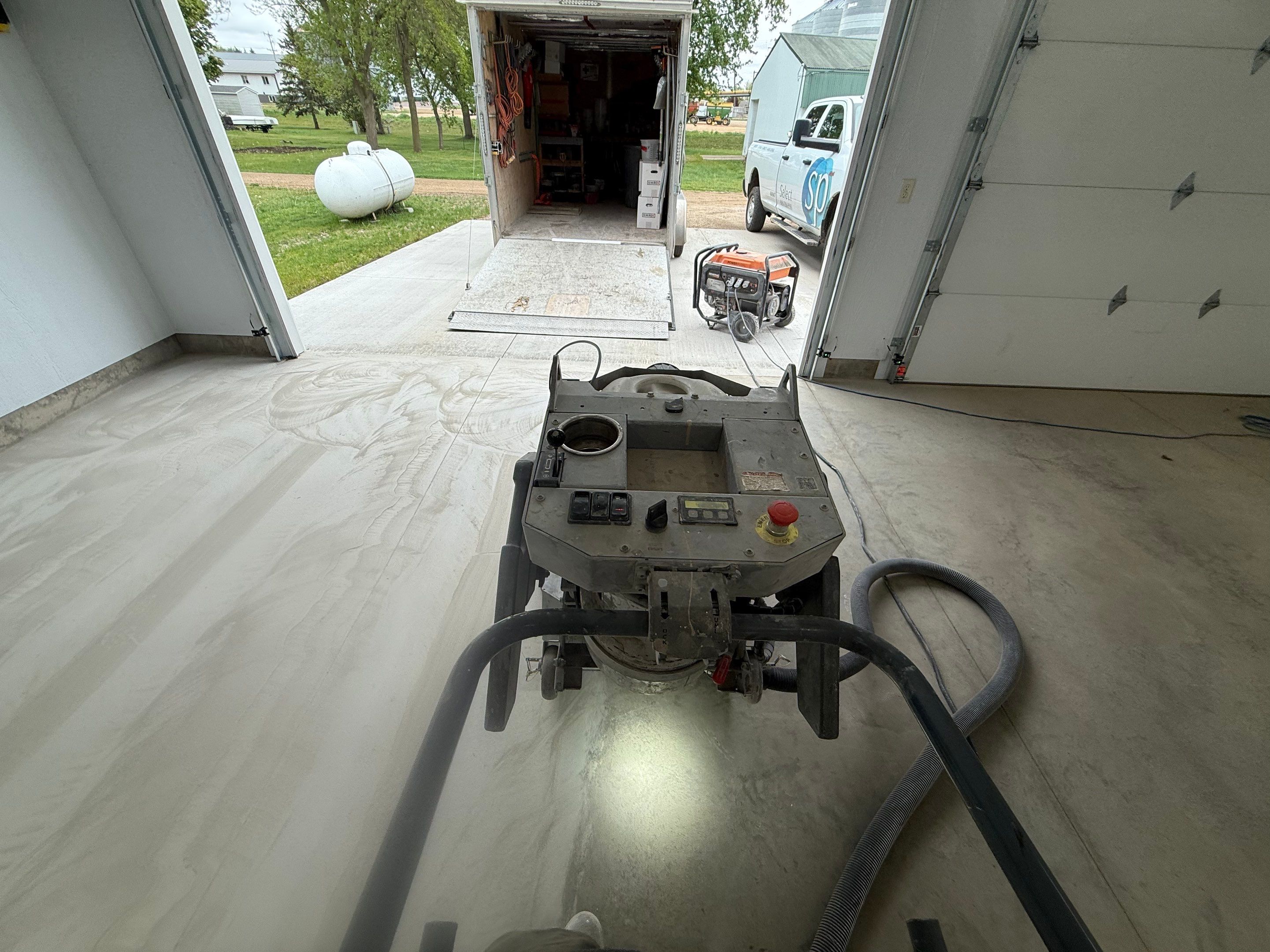 Speckled Epoxy Concrete Coating for Edgerton Garage Floor by Select Painting, Coatings & Garage Cabinets