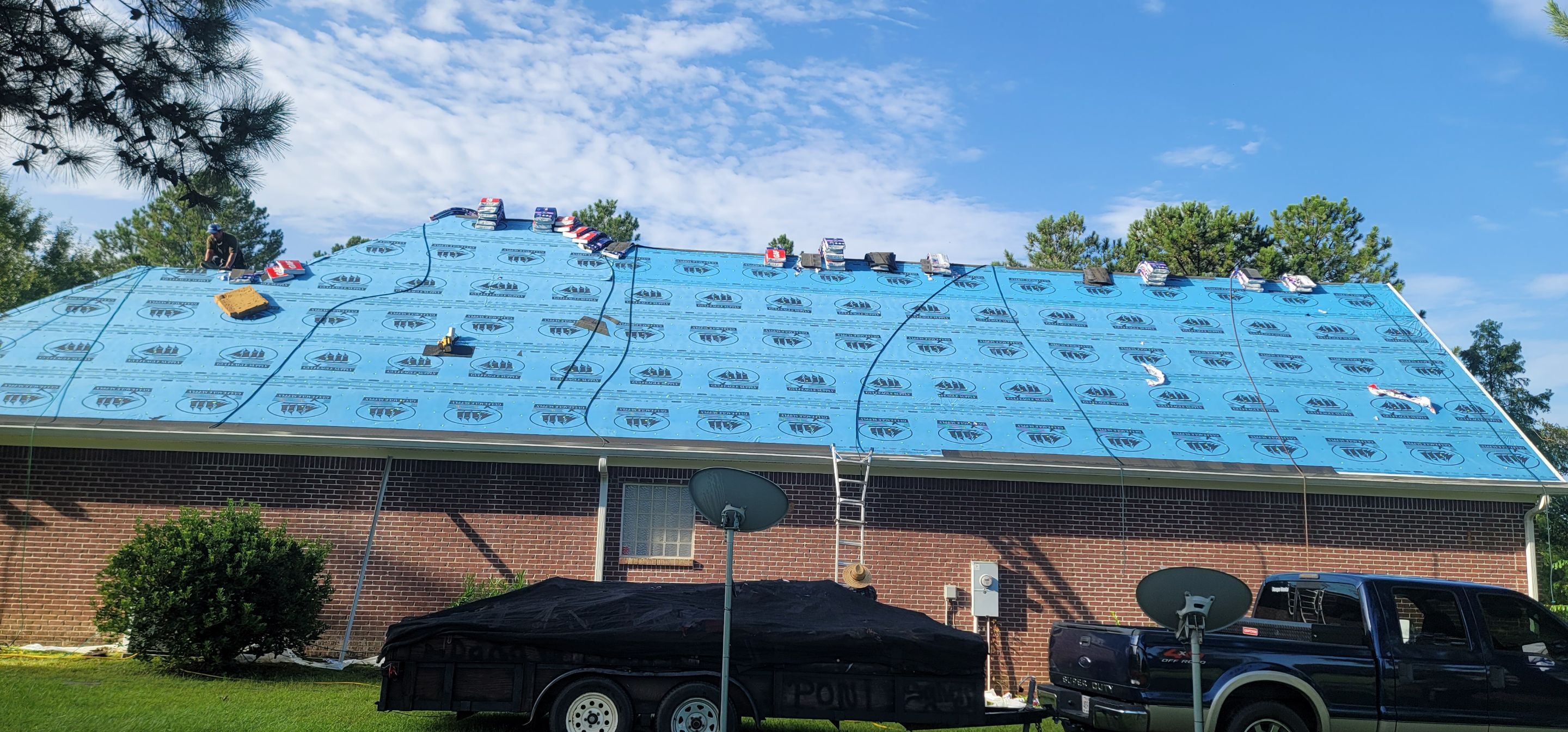 Residential Roofing Installation using Roof Replacement by American Roofing & Construction LLC